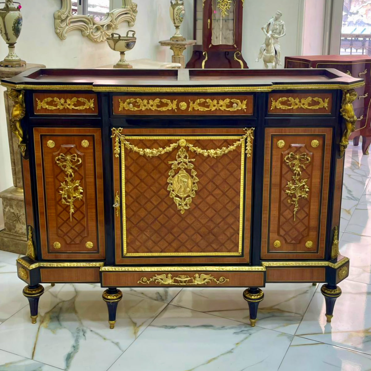 French-Style Louis XVI Sideboard – Rich Wood, Gold Leaf & Ornate Bronze Details