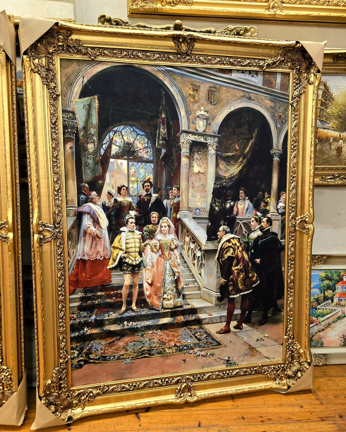 European Salon Entrance Artwork – Elegant Figures in a Grand Interior with Ornate Gold Leaf Frame
