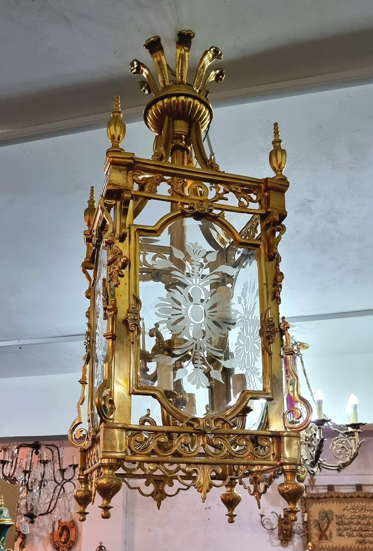 French Empire Gilded Bronze Lantern Chandelier with Ornate Gold Leaf Details and Glass Cage Design