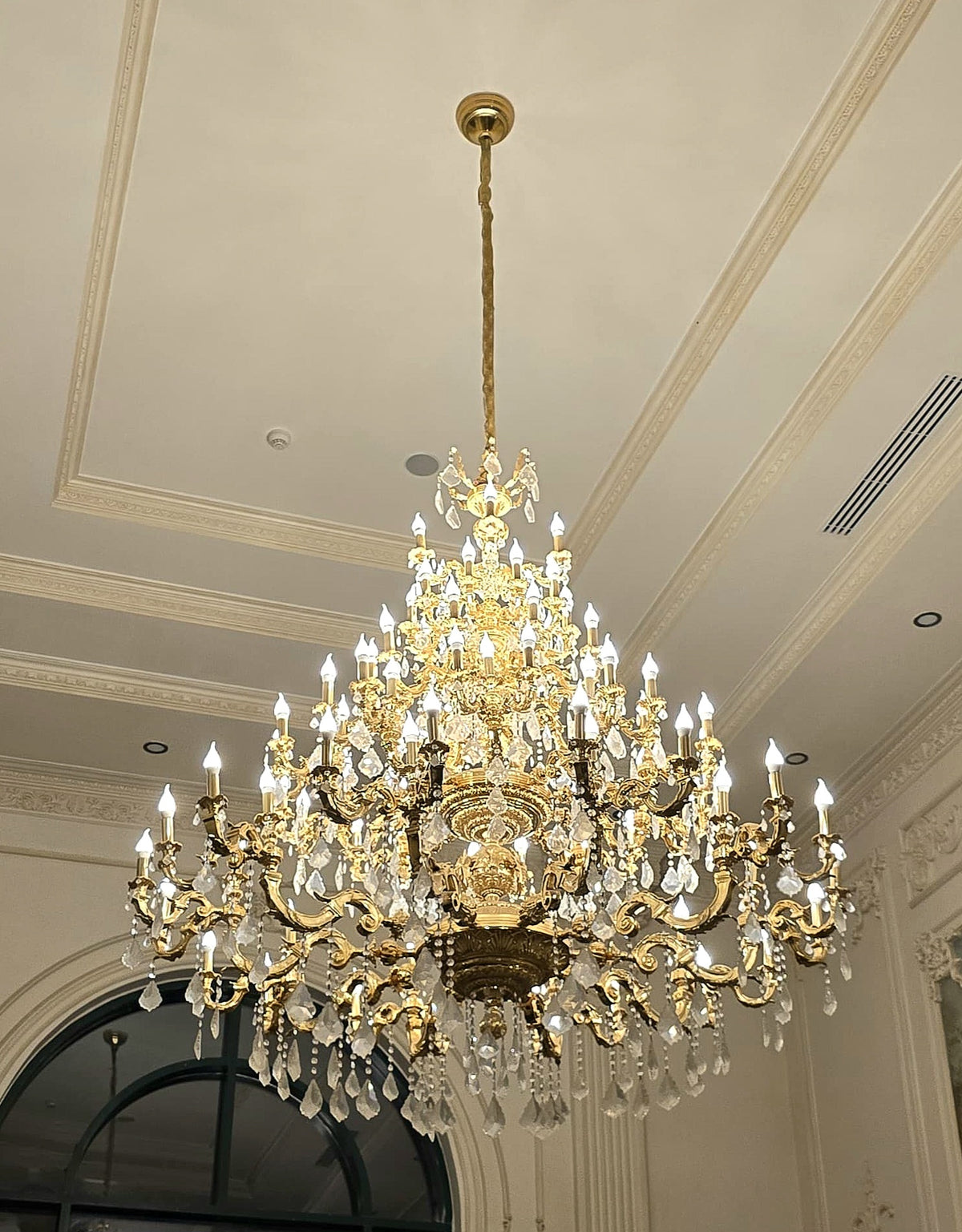 Monumental French Crystal Chandelier with Gold Leaf & Ornate Bronze Details