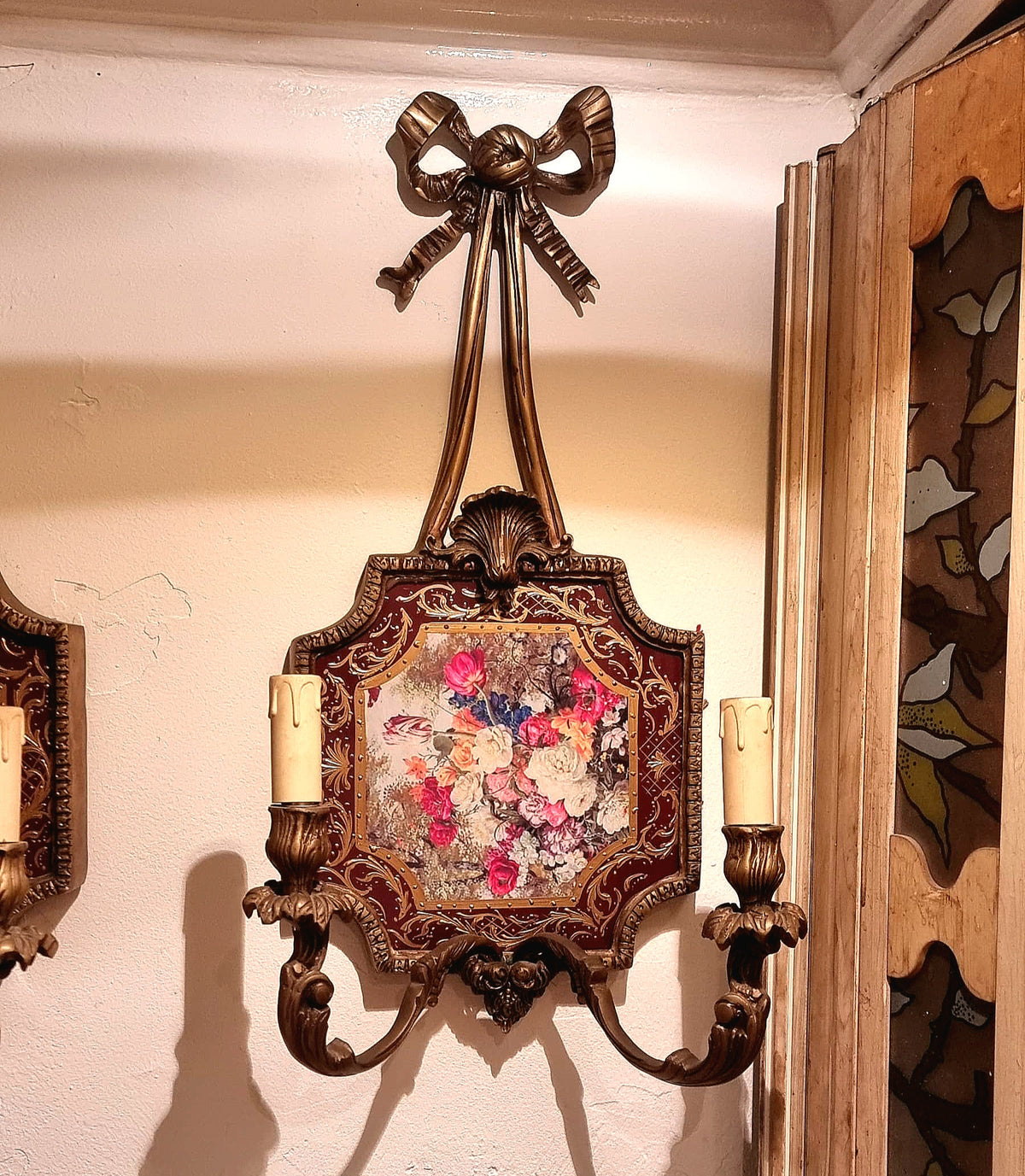 French-Style Bronze Two-Light Wall Sconce with Ornate Bow, Floral Center Panel and Scrolling Foliate Details