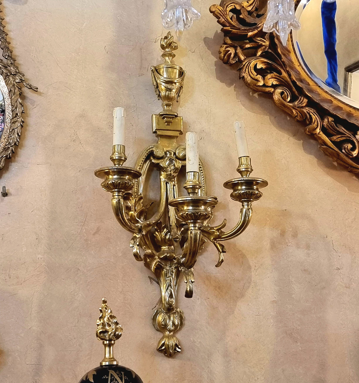 French Louis XV Style Five-Light Gilded Bronze Wall Sconce with Elaborate Foliate Scrollwork and Ornate Gold Leaf Details
