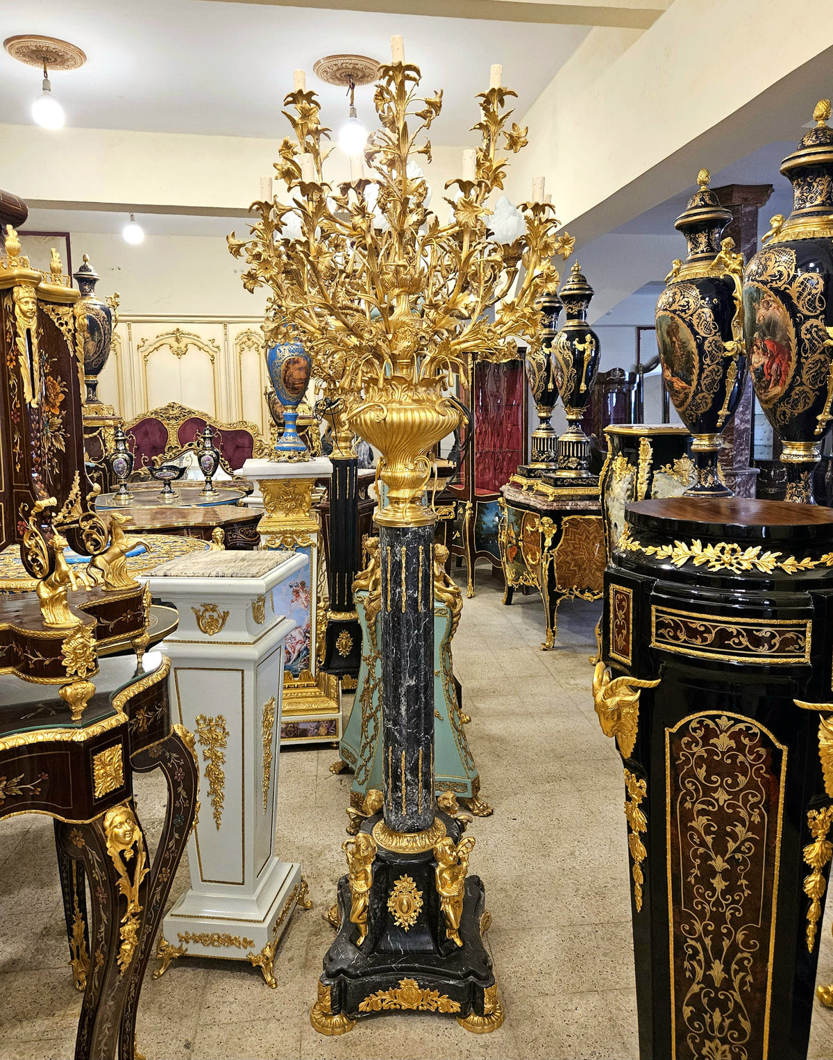 Elegant Louis XVI Style Black Pedestal Candelabra with Gold Leaf Floral Details & Gilded Bronze Accents