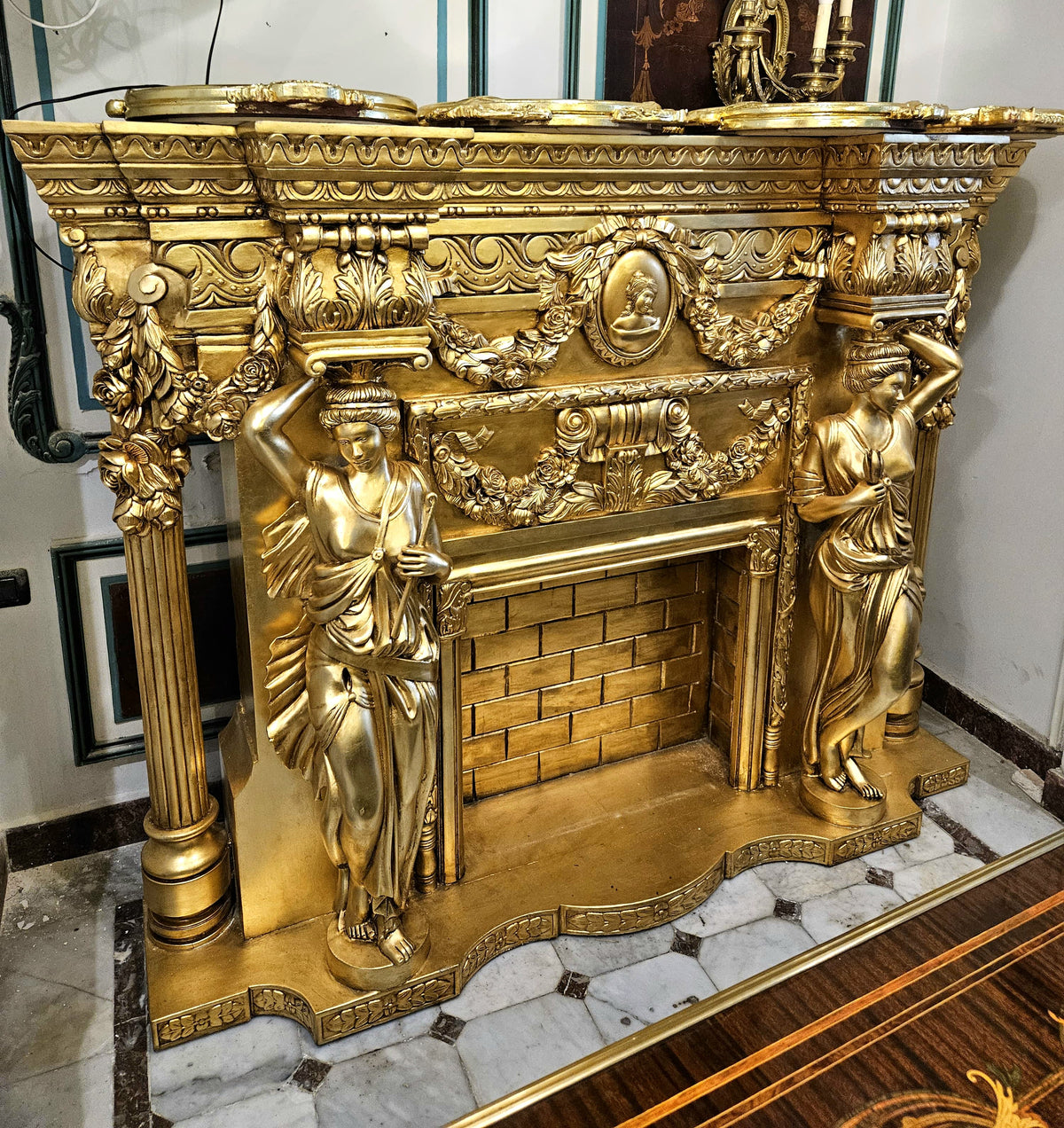 Grand French-Style Fireplace Mantel – Ornate Gold Leaf Finish with Sculpted Bronze Details