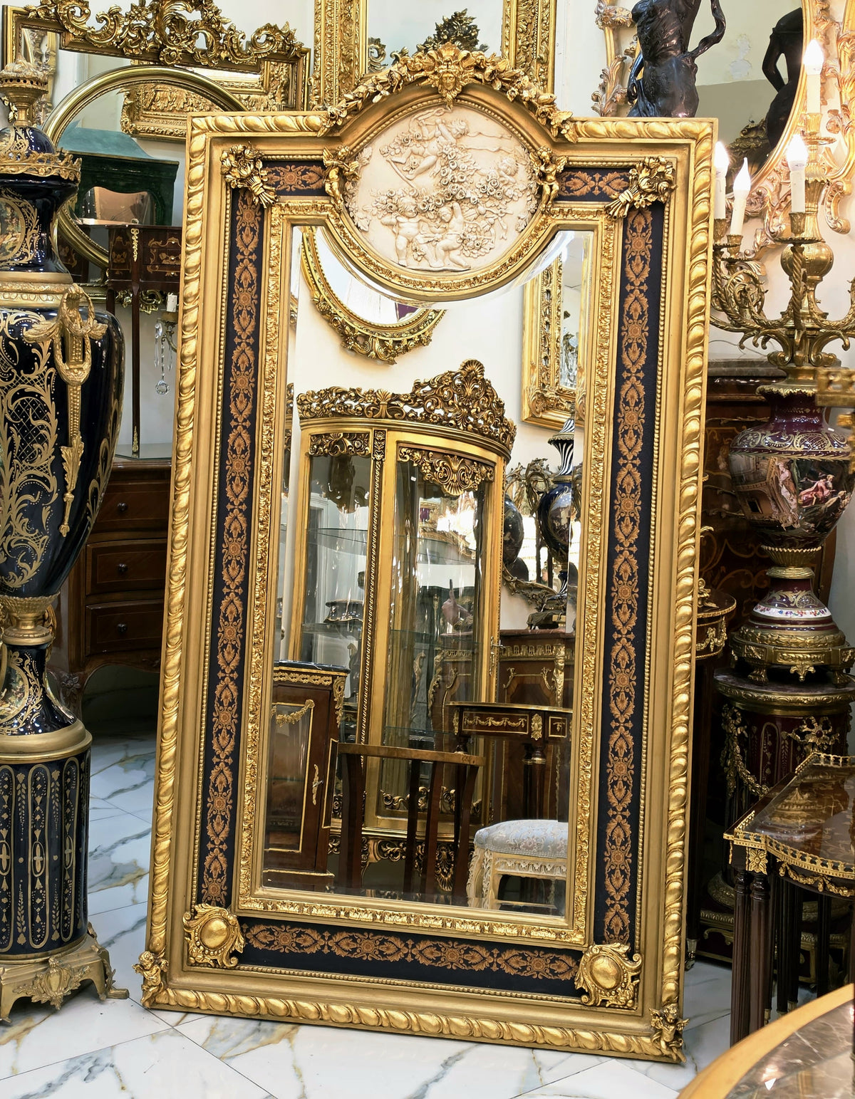 Grand French-Style Gilded Wall Mirror – Ornate Gold Leaf Frame with Cherub Medallion & Blue Decorative Panels