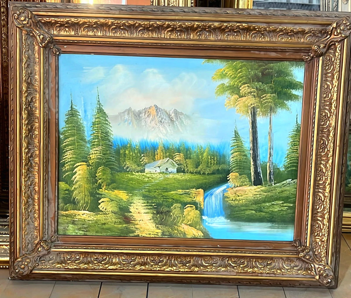 Mountain Cottage Landscape Painting – Ornate Gold Leaf Frame with Waterfall, Forest & Alpine Scenery
