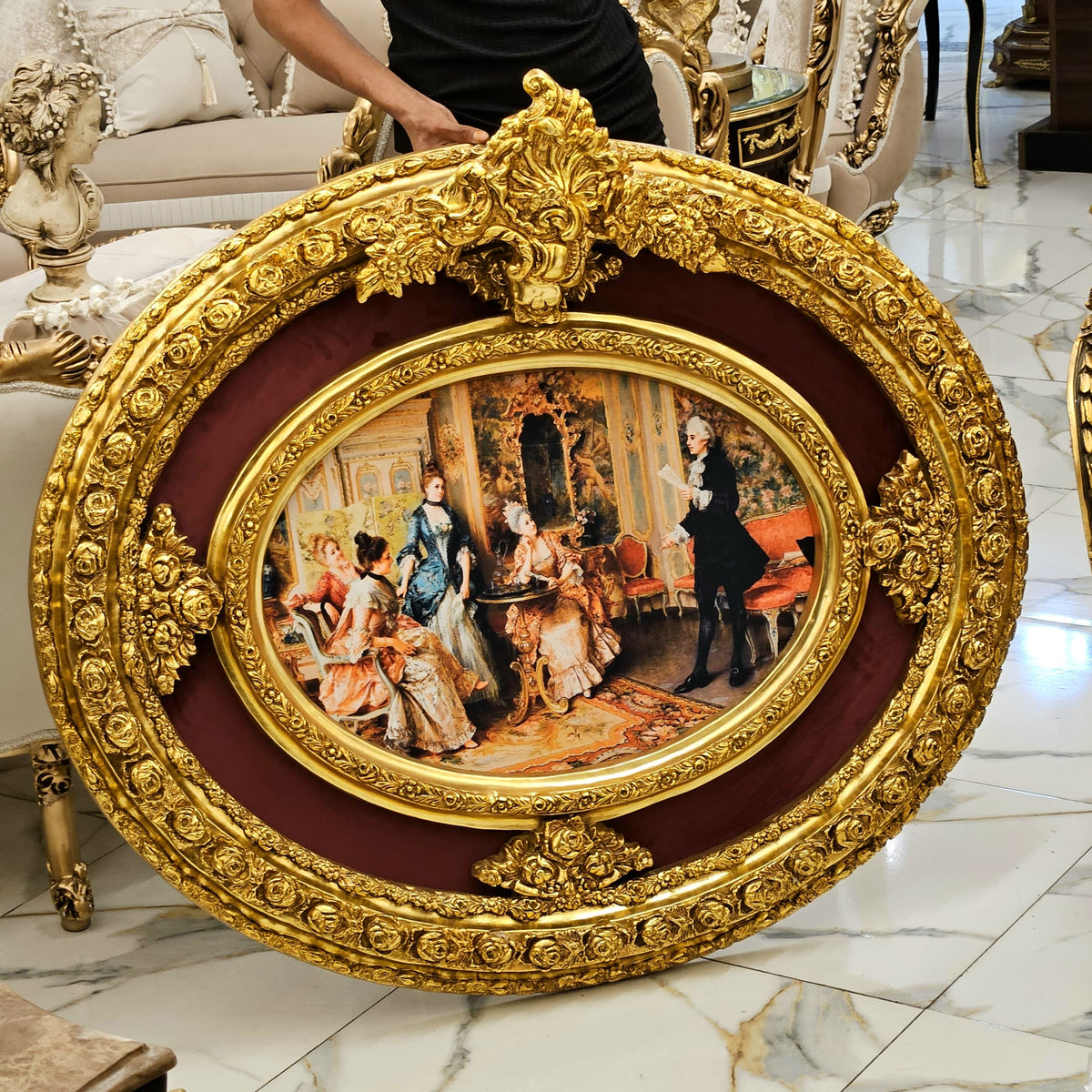 The Gilded Salon – Oval Victorian Genre Painting with Burgundy Velvet & Ornate Gold Leaf Frame