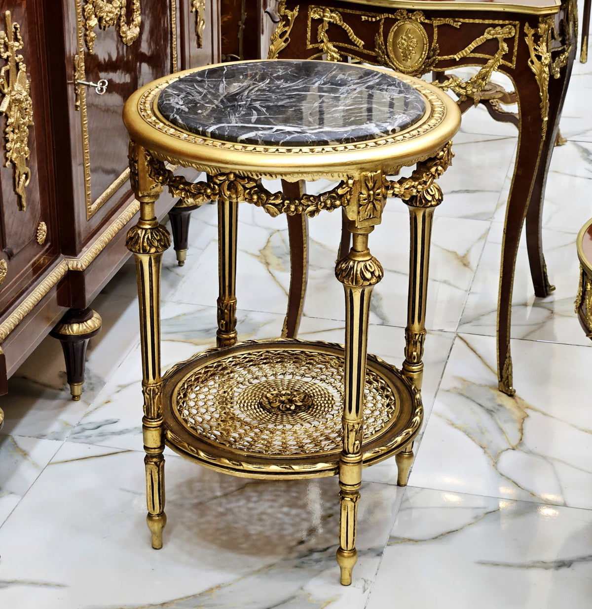 Gilded Elegance – French-Inspired Side Table with Dark Marble Top & Ornate Gold Leaf Details