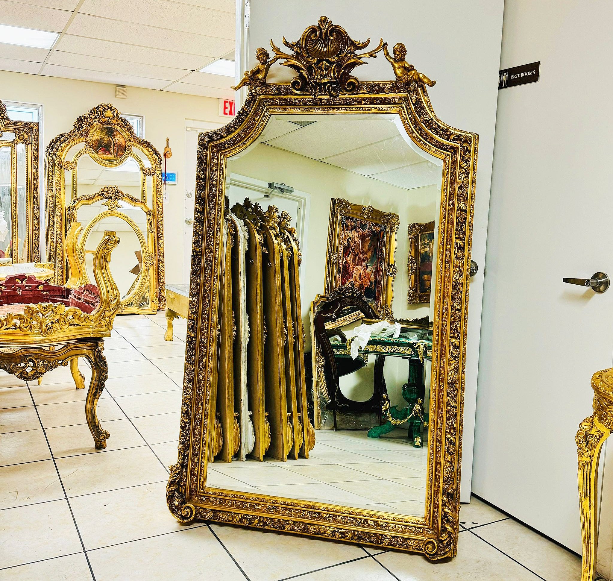French Baroque Gold Leaf Floor Mirror Handcrafted w/ Angel Ornate Details