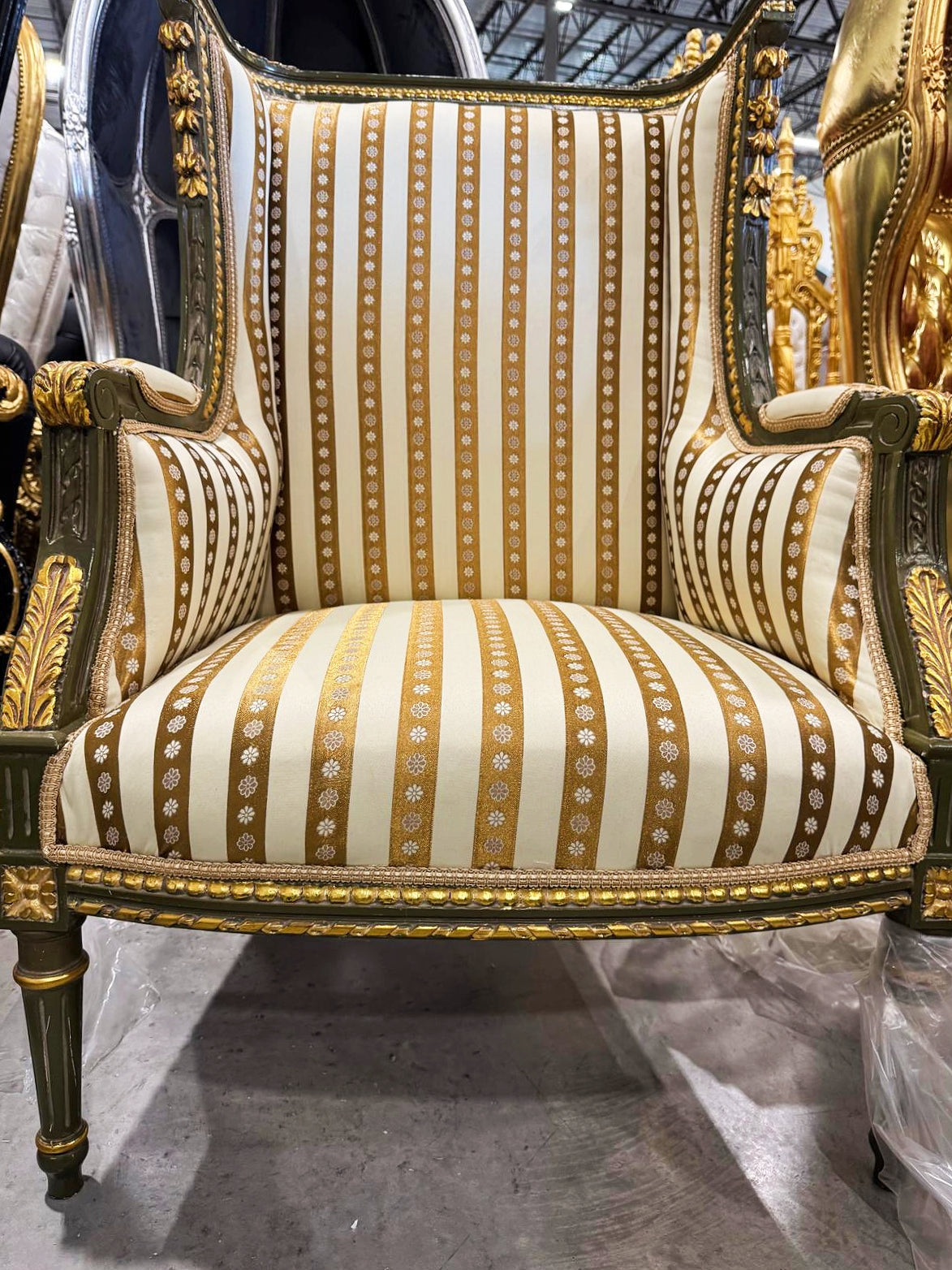 French Louis XV Style Gold Bergere Wing Chair with Gold Details