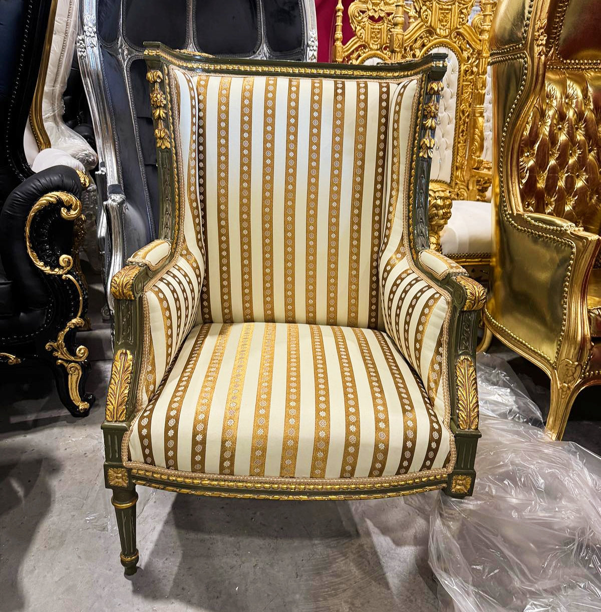 French Louis XV Style Gold Bergere Wing Chair with Gold Details