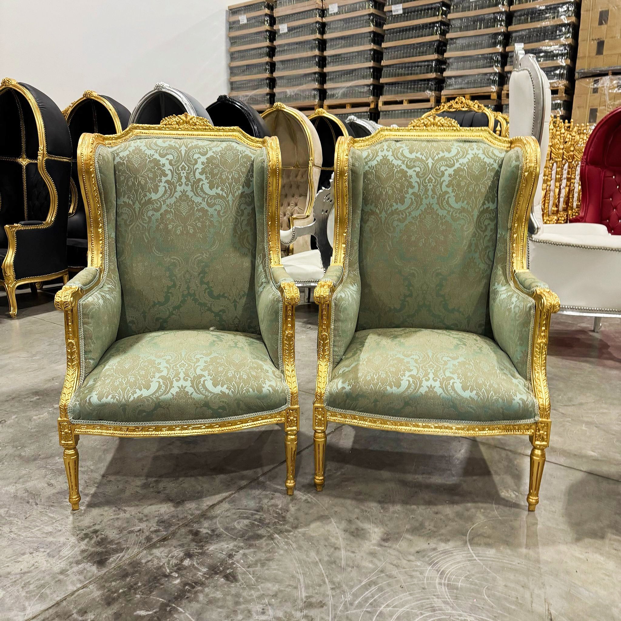 French Louis XV Style Green Bergère Wing Chair with Gold Leaf Details