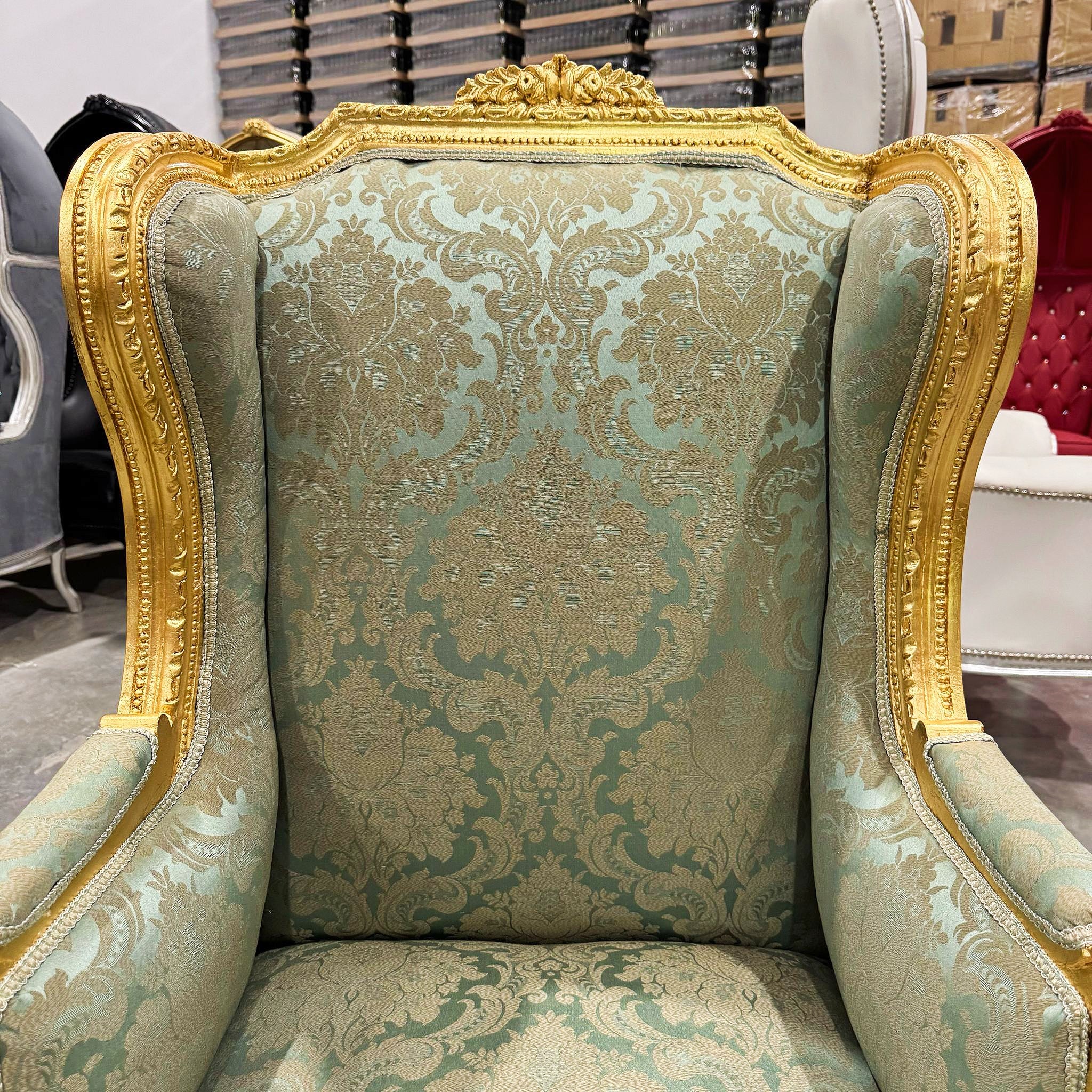 French Louis XV Style Green Bergère Wing Chair with Gold Leaf Details