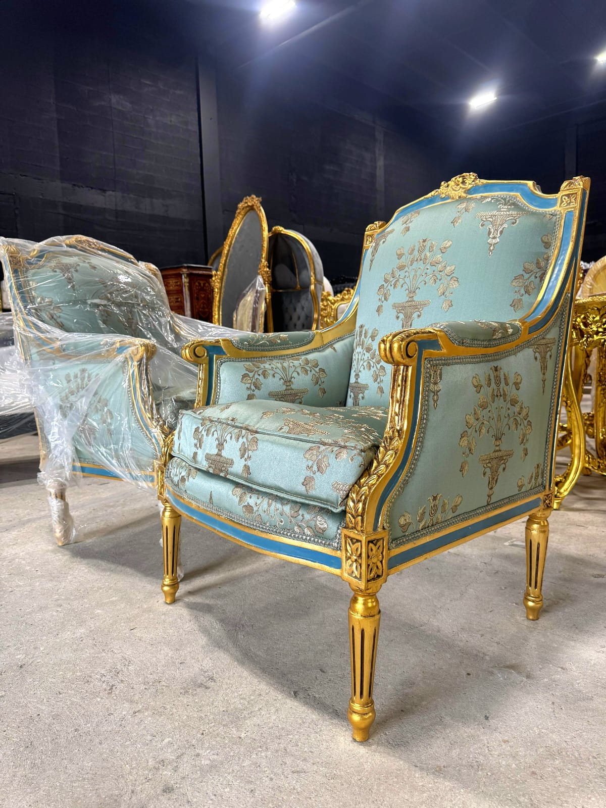 French Louis XV Style Blue-Green Bergere Wing Chair with Blue Trim and Gold Leaf Details