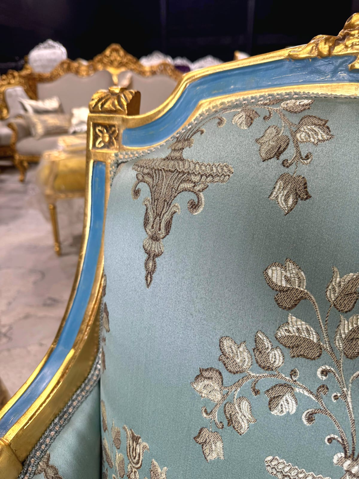 French Louis XV Style Blue-Green Bergere Wing Chair with Blue Trim and Gold Leaf Details