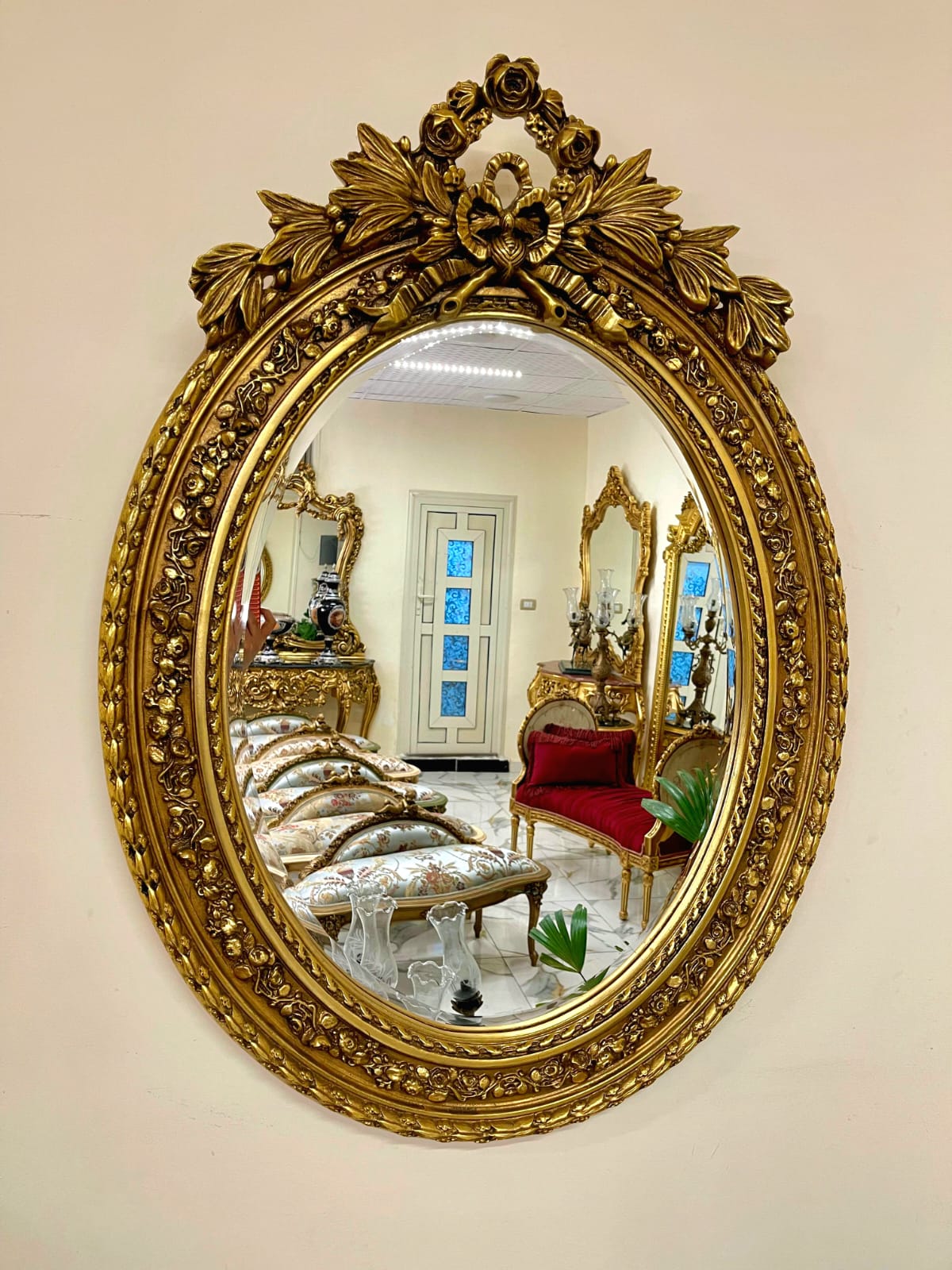 Grand Italian Rococo Oval Wall Mirror with Floral Gold Leaf Frame