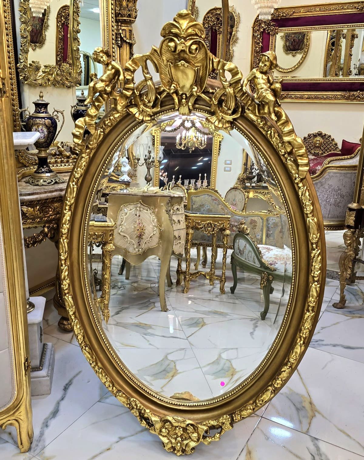 French Cherub Wall Mirror – Hand Carved Gold Leaf Frame with Ornate Floral Details