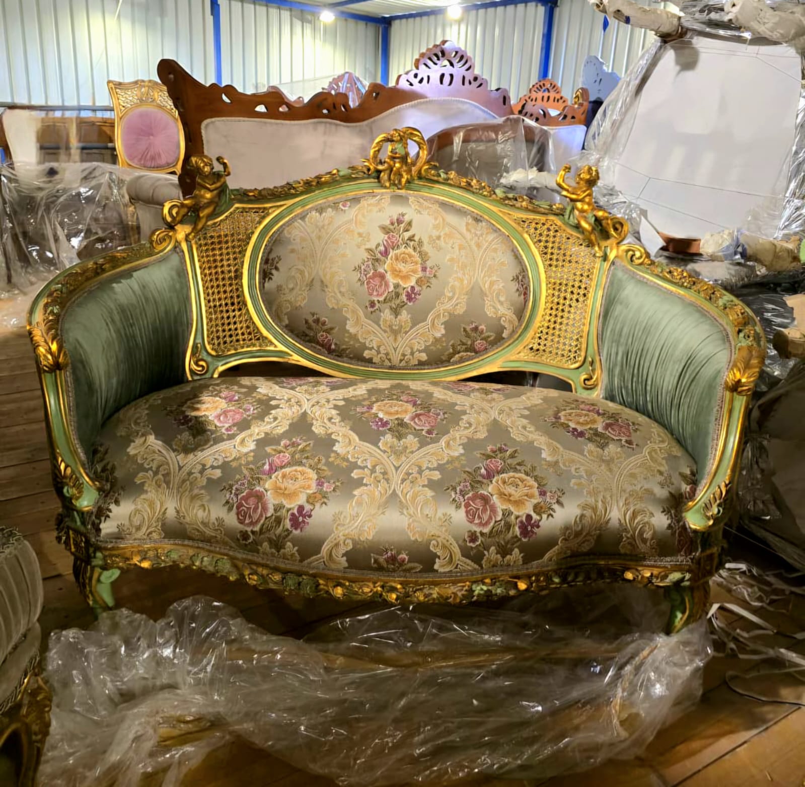 French Louis XV Romantic Loveseat with Floral Damask Upholstery, Sage Green Velvet Panels, Cherubs & Hand-Gilded Gold Leaf Frame