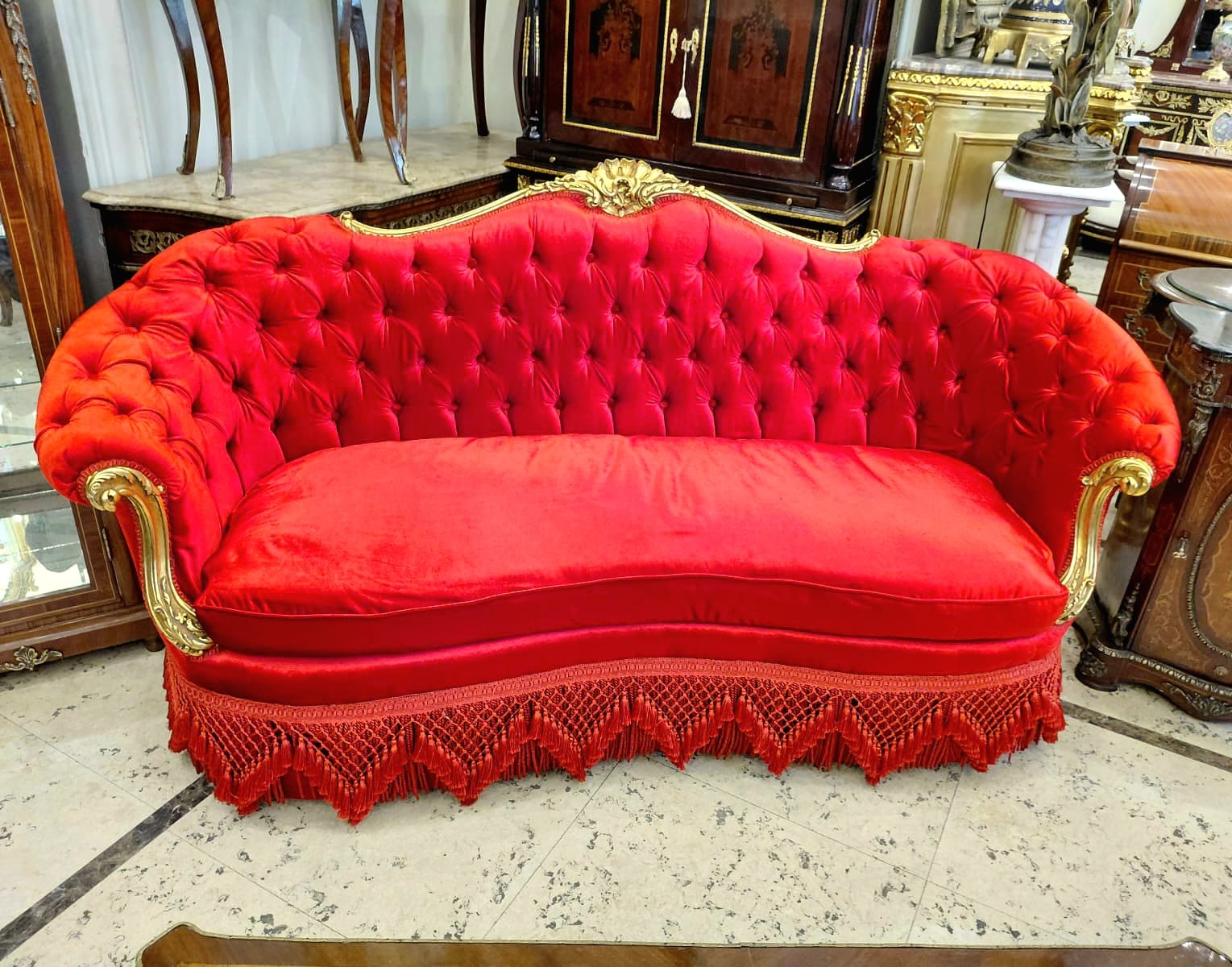 Grand French Victorian Three-Seat Red Velvet Sofa with Hand-Carved Gold Leaf Frame