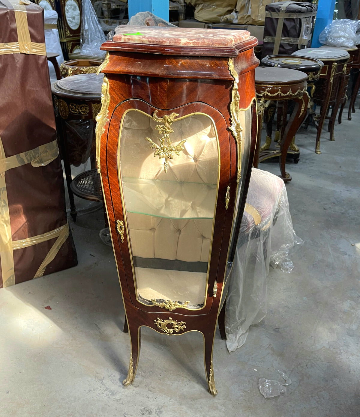 Petite French-Style Display Vitrine – Rich Wood Finish, Beige Tufted Velvet Interior & Gold Leaf Details