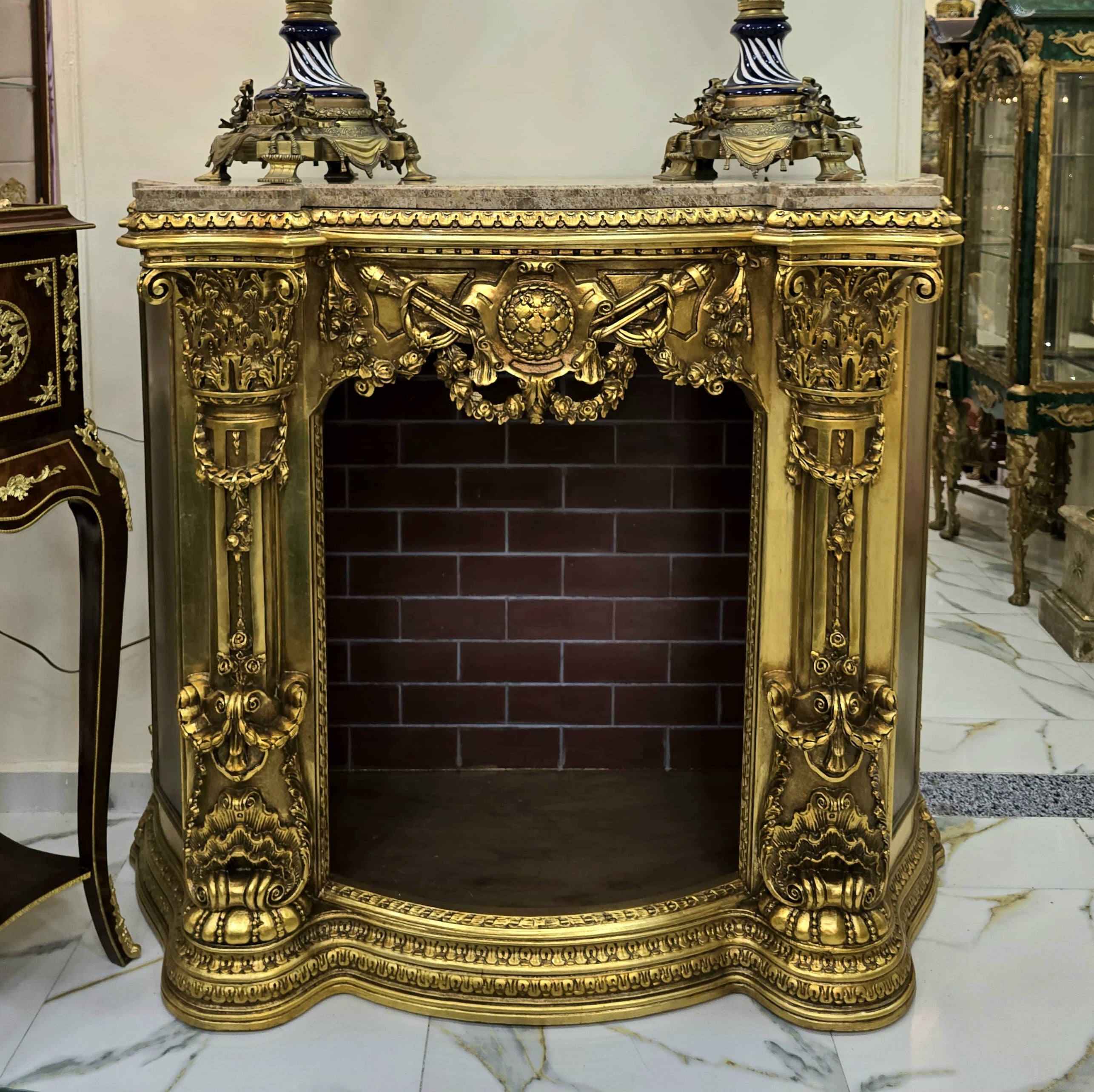 Ornate French Style Fireplace Cabinet with Marble Top & Gold Leaf Accents