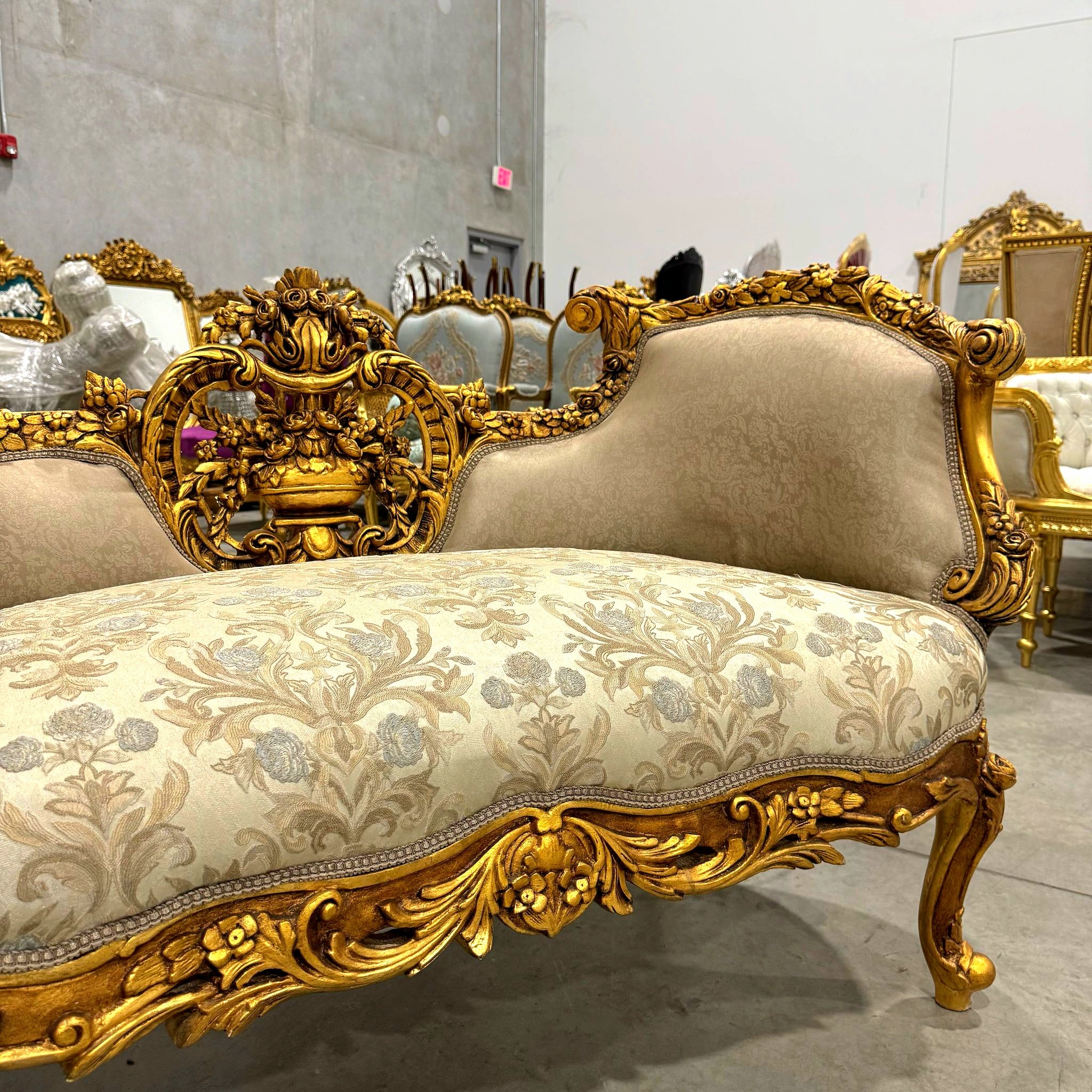 Elegant French Settee – Light Brown Upholstery & Gold Leaf Accents