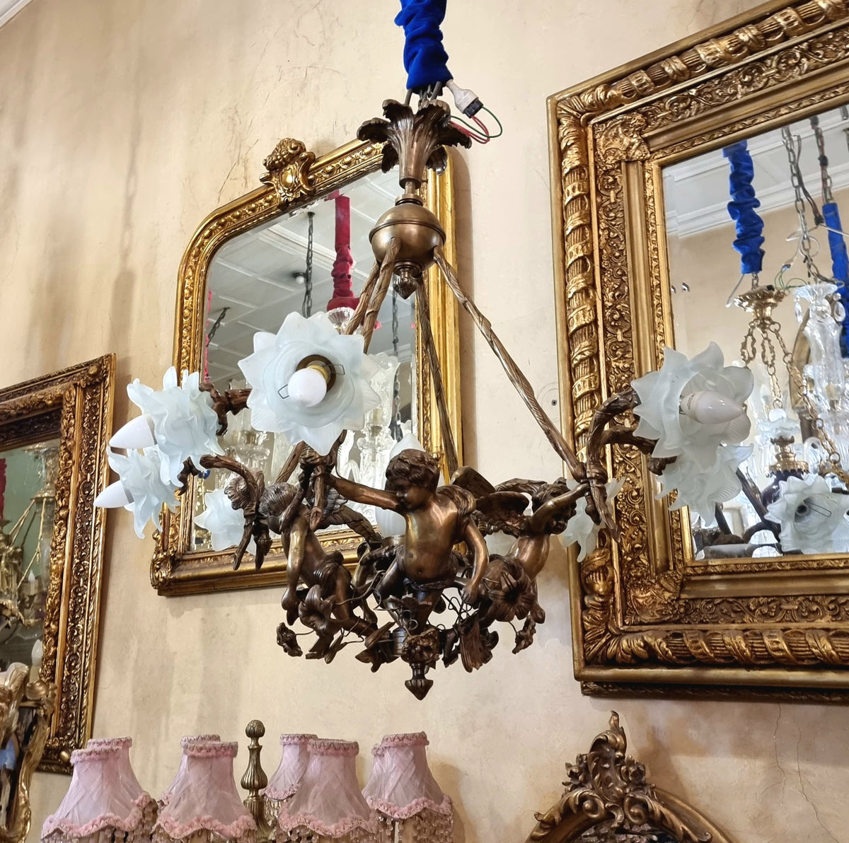 Cupid’s Embrace – Romantic French Chandelier with Sculpted Cherubs, Floral White Glass Shades & Gilded Details