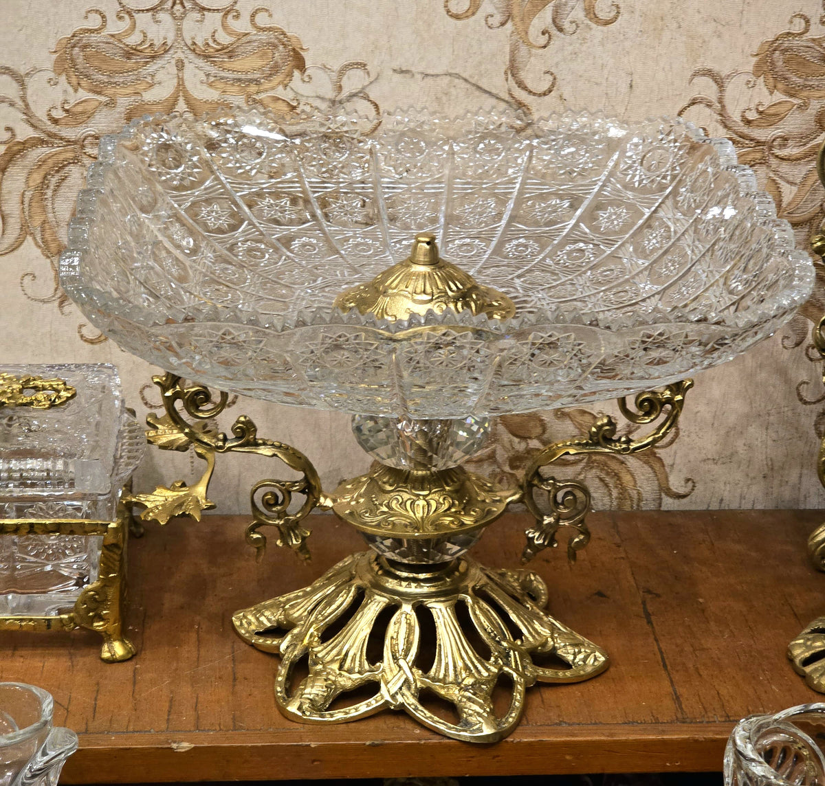 The Gilded Crystal Embrace – French-Inspired Cut Crystal Centerpiece with Sculptural Gold Scrollwork