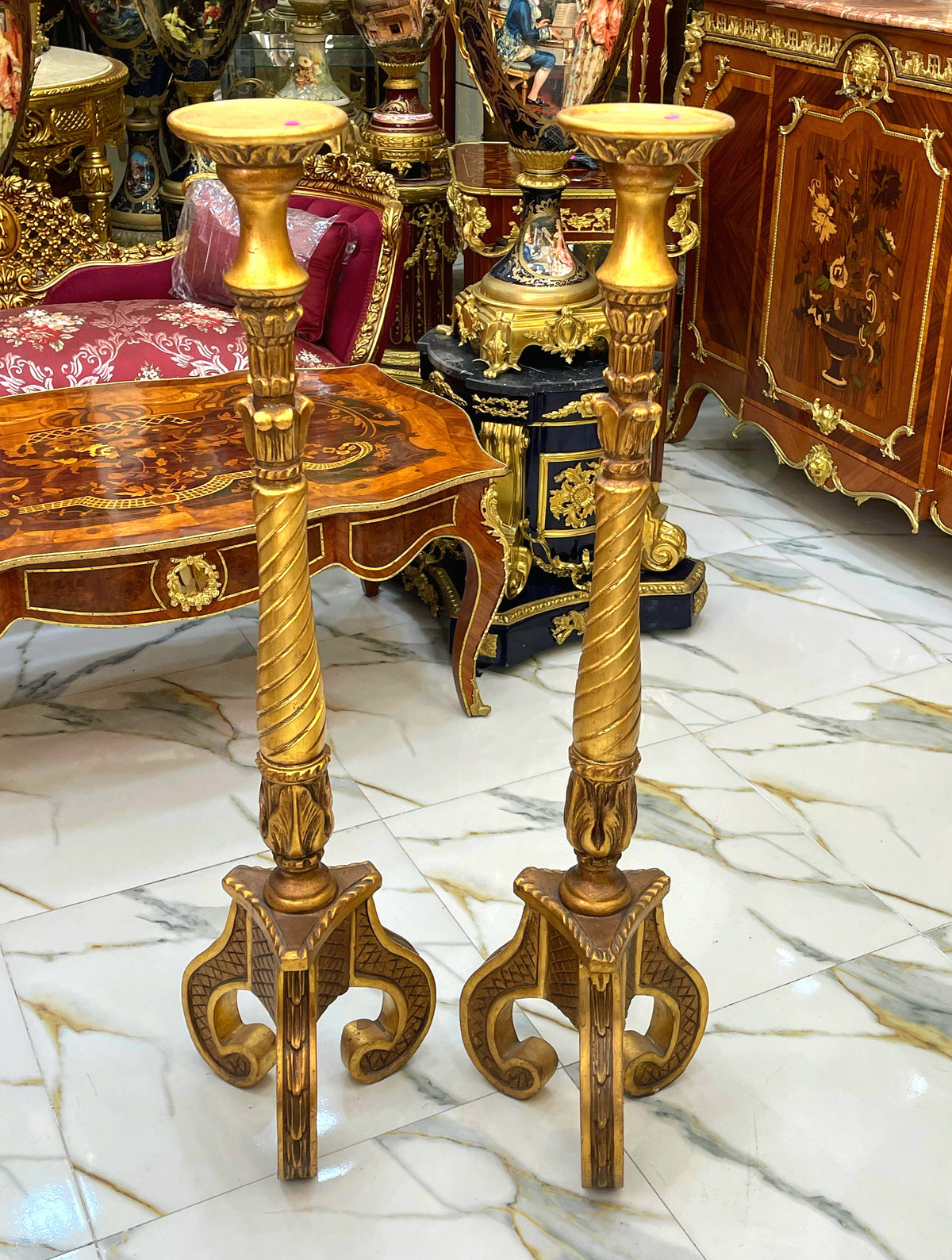 Pair of Sculptural Gilded Pedestals – Gold Leaf Finish with Twisted Columns & Ornate Tripod Bases