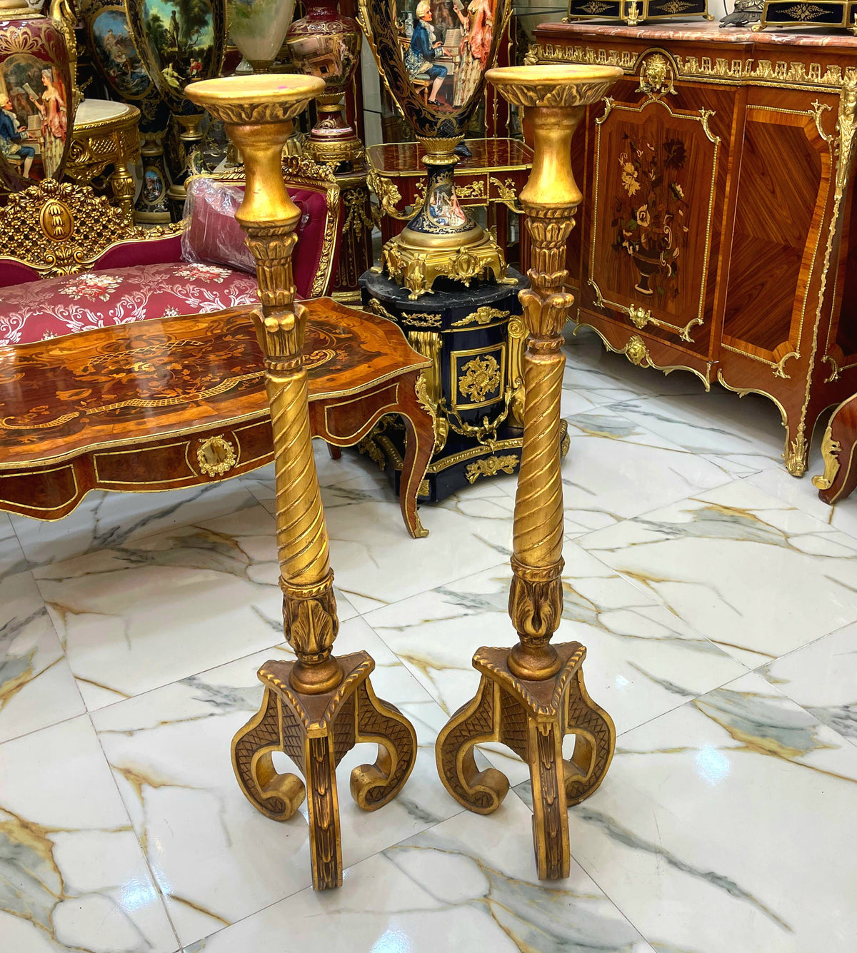 Pair of Sculptural Gilded Pedestals – Gold Leaf Finish with Twisted Columns & Ornate Tripod Bases