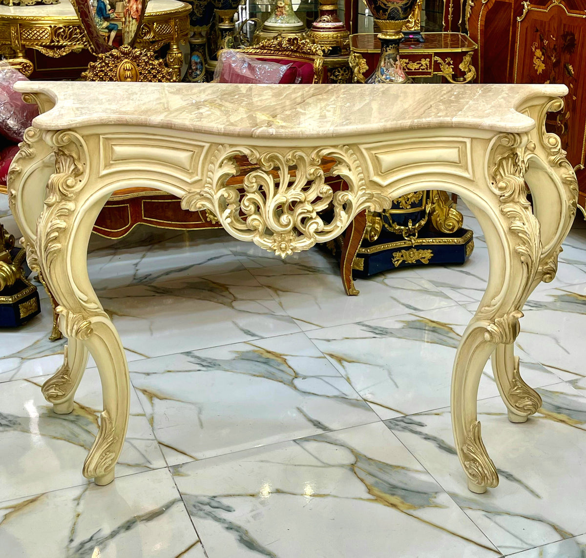 French-Style Console Table – Off-White Finish, Light Marble Top & Ornate Gold Leaf Details