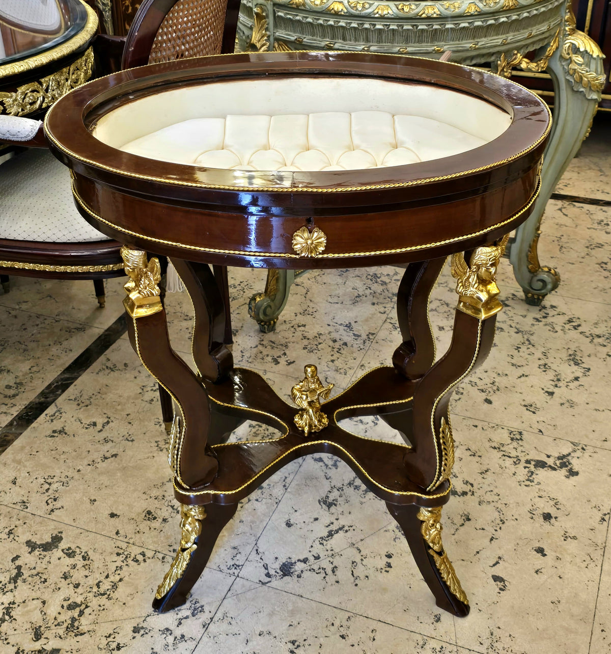 French-Style Oval Side Table – Glass Top, Rich Wood Finish & Ornate Gold Leaf Details