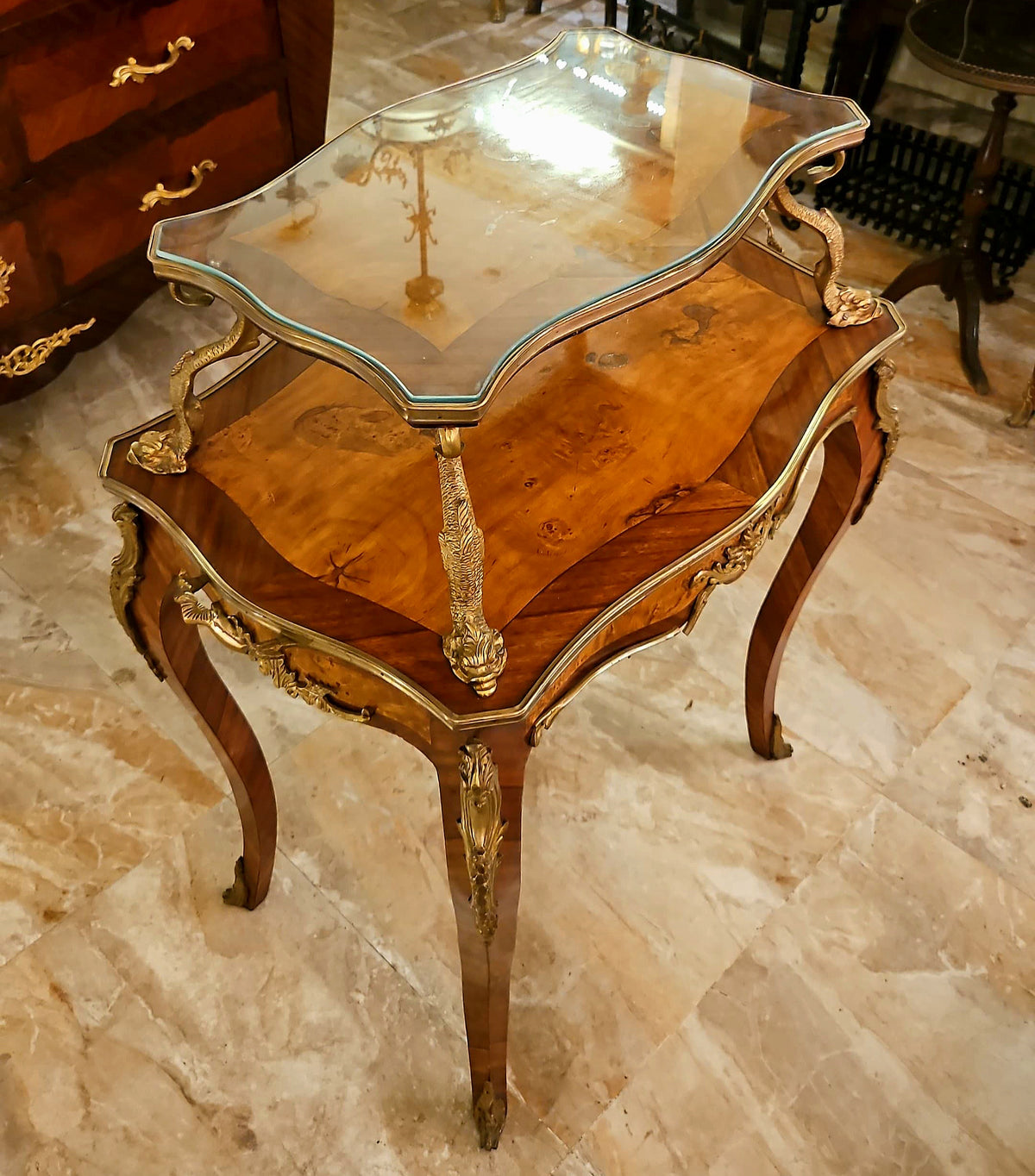 French-Style Serving Table – Rich Wood Finish, Glass Top & Ornate Gold Leaf Details