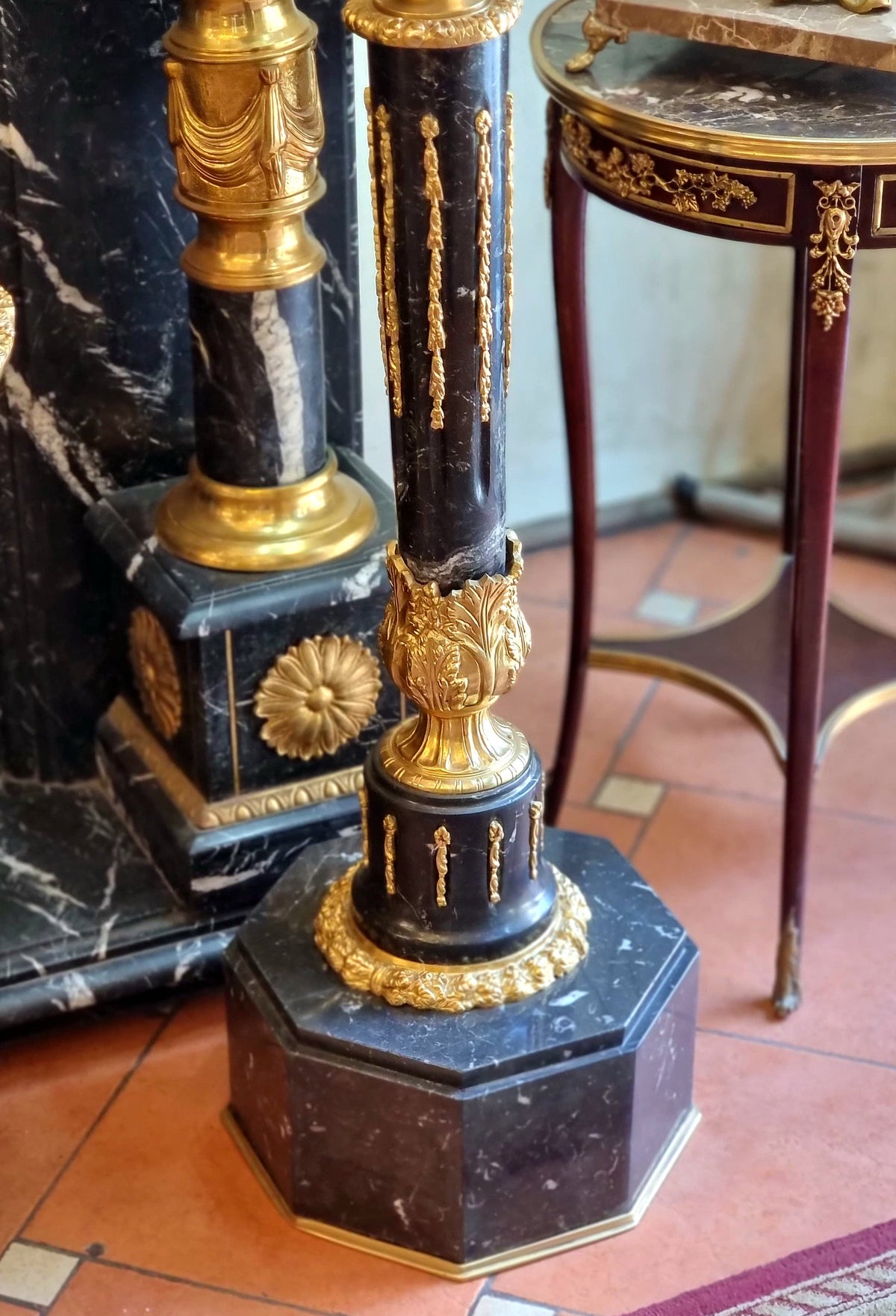 French Empire Style Black Marble Pedestal with Porcelain Urn, Bronze Mounts, Gold Leaf and Sculpted Details
