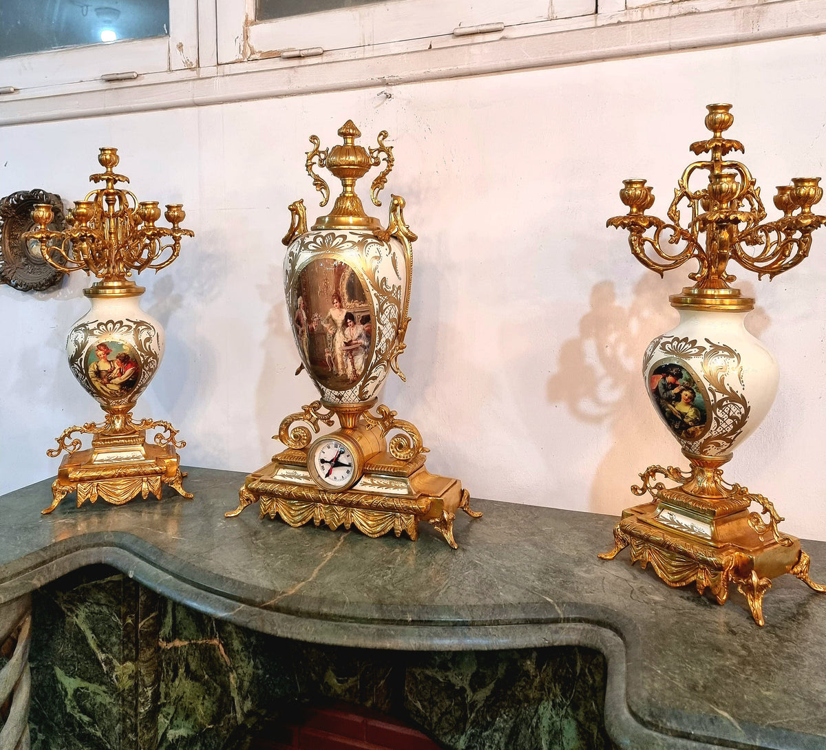 French Rococo Style Three-Piece Mantel Set with Porcelain Vases, Gilded Bronze Candelabras and Figural Storytelling Scenes