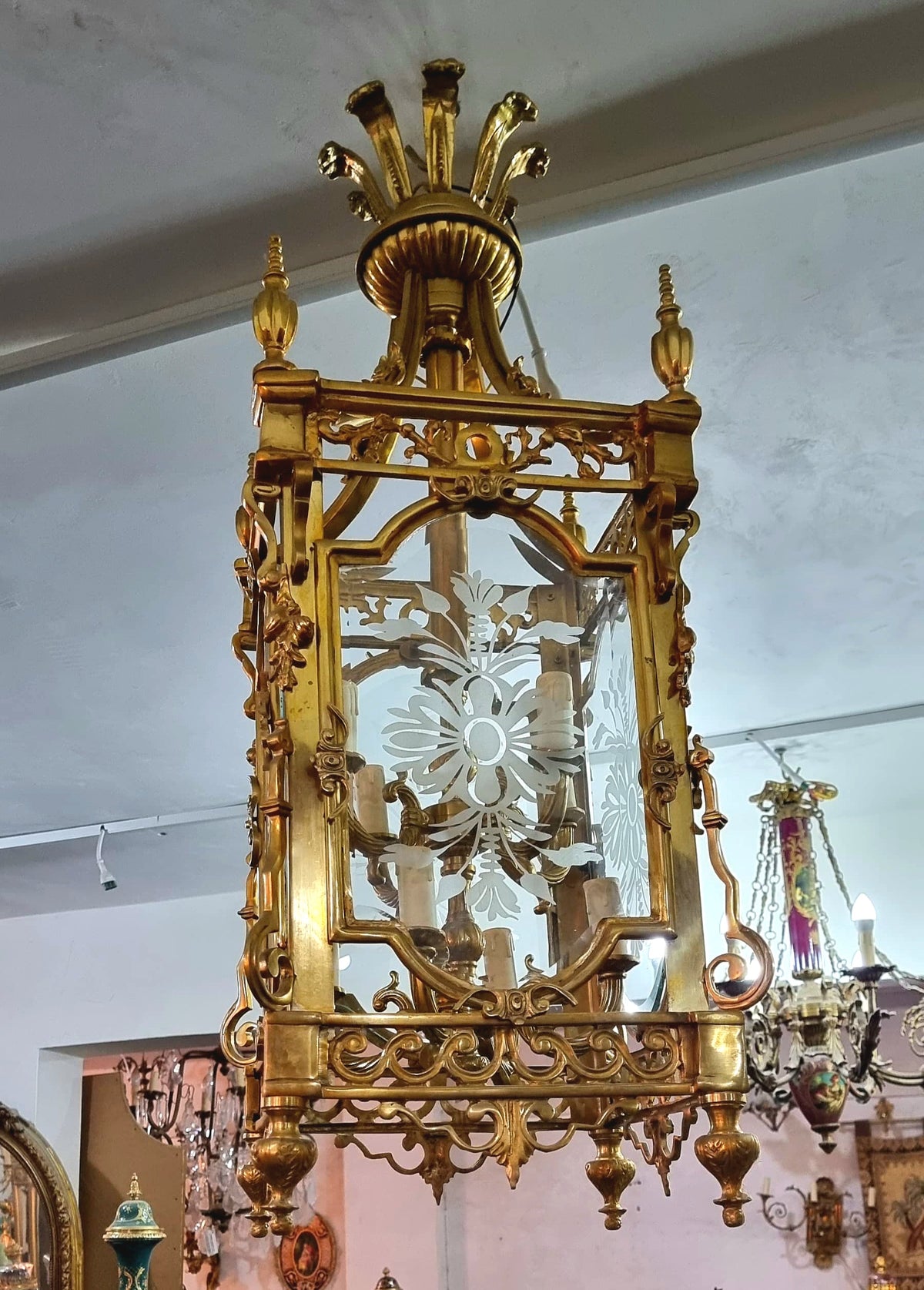 French Empire Gilded Bronze Lantern Chandelier with Ornate Gold Leaf Details and Glass Cage Design