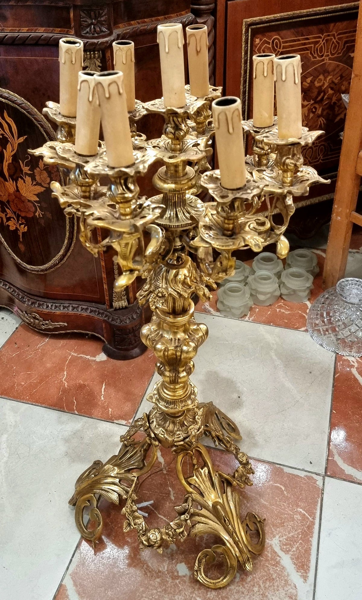 French Louis XV Style Nine-Light Gilded Bronze Candelabra with Gold Leaf and Elaborate Foliate Details