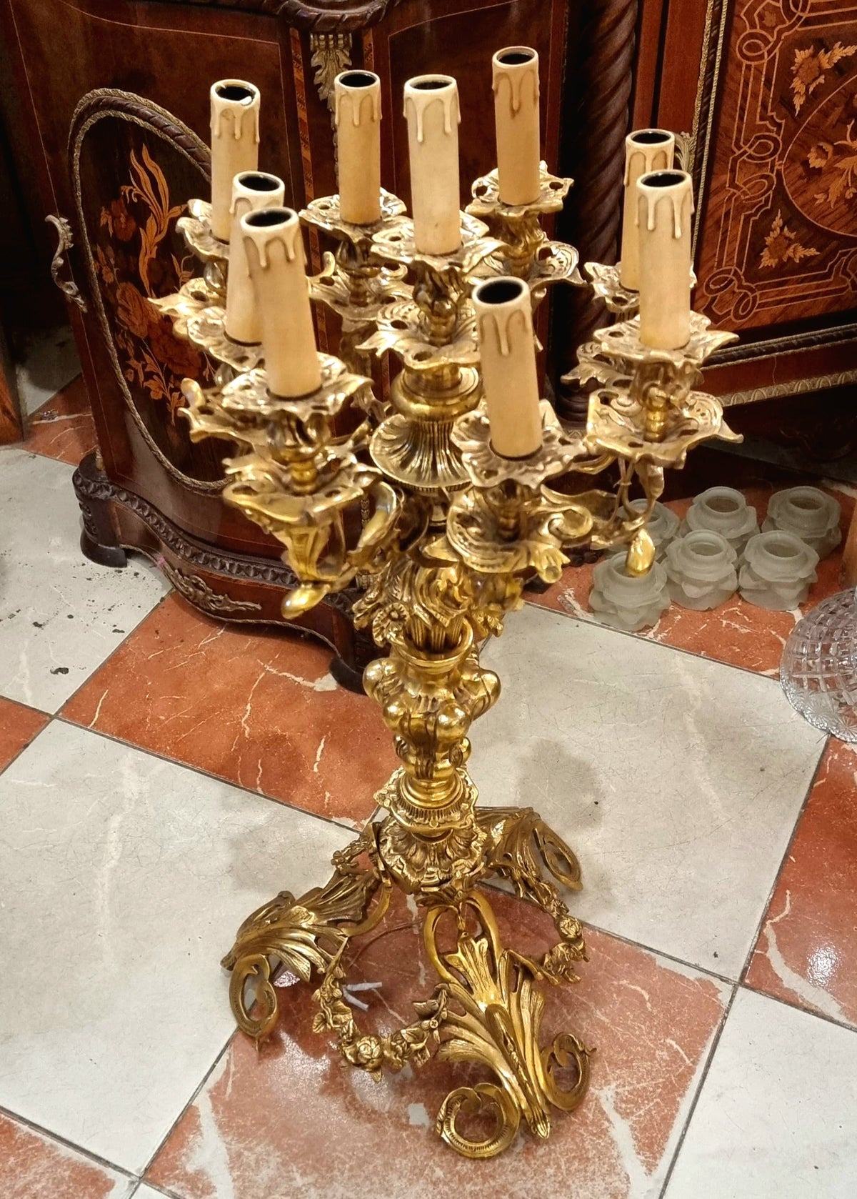 French Louis XV Style Nine-Light Gilded Bronze Candelabra with Gold Leaf and Elaborate Foliate Details