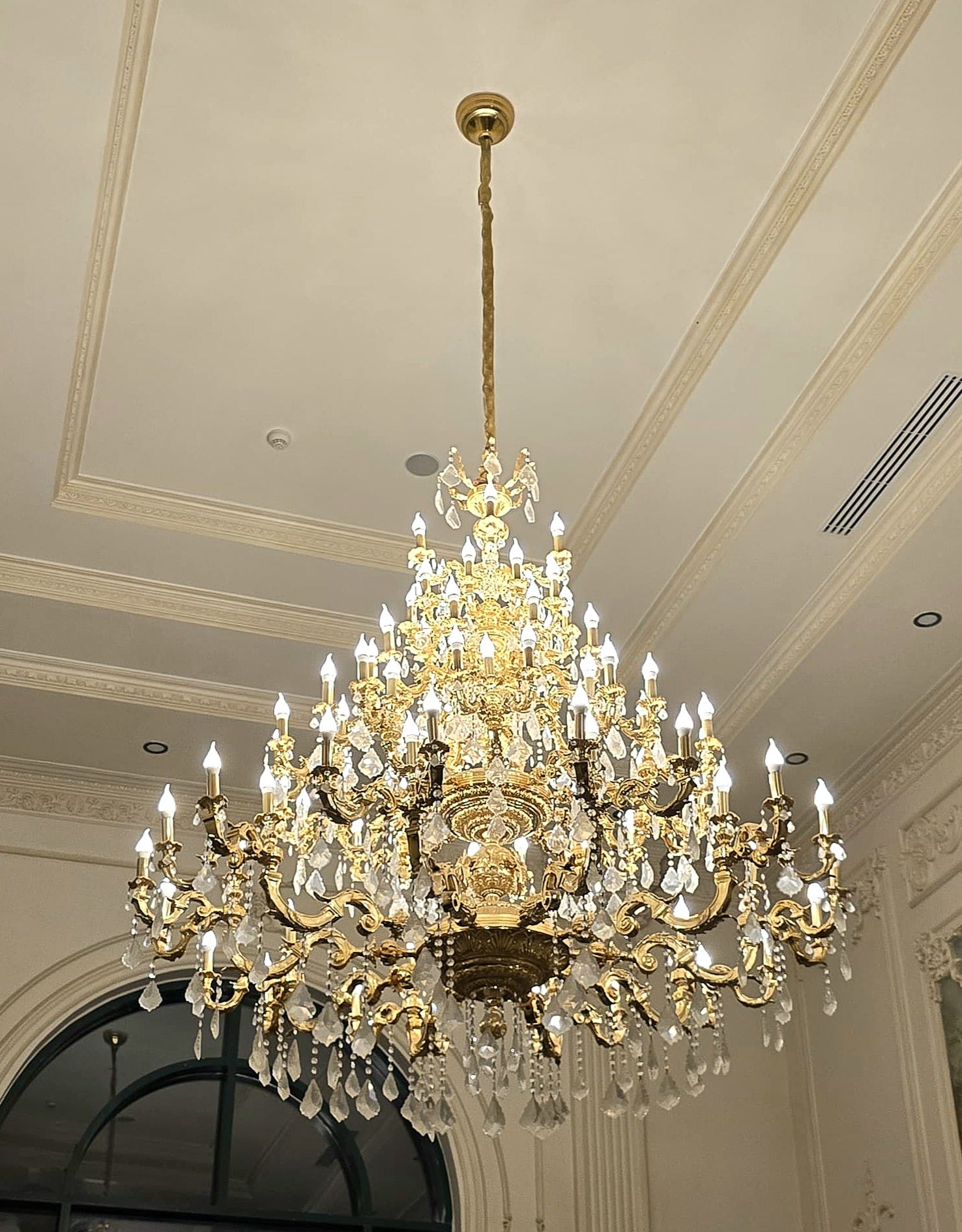 Monumental French Crystal Chandelier with Gold Leaf & Ornate Bronze Details