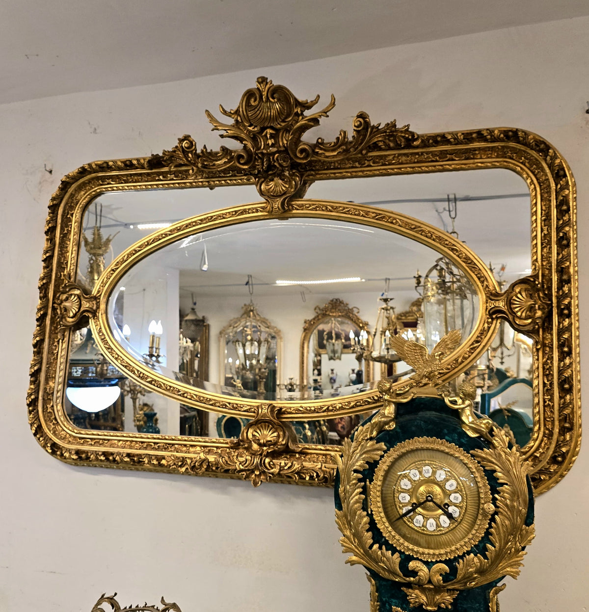 Elegant French Rococo Gold Mirror – Ornate Gilded Frame with Oval Beveled Center