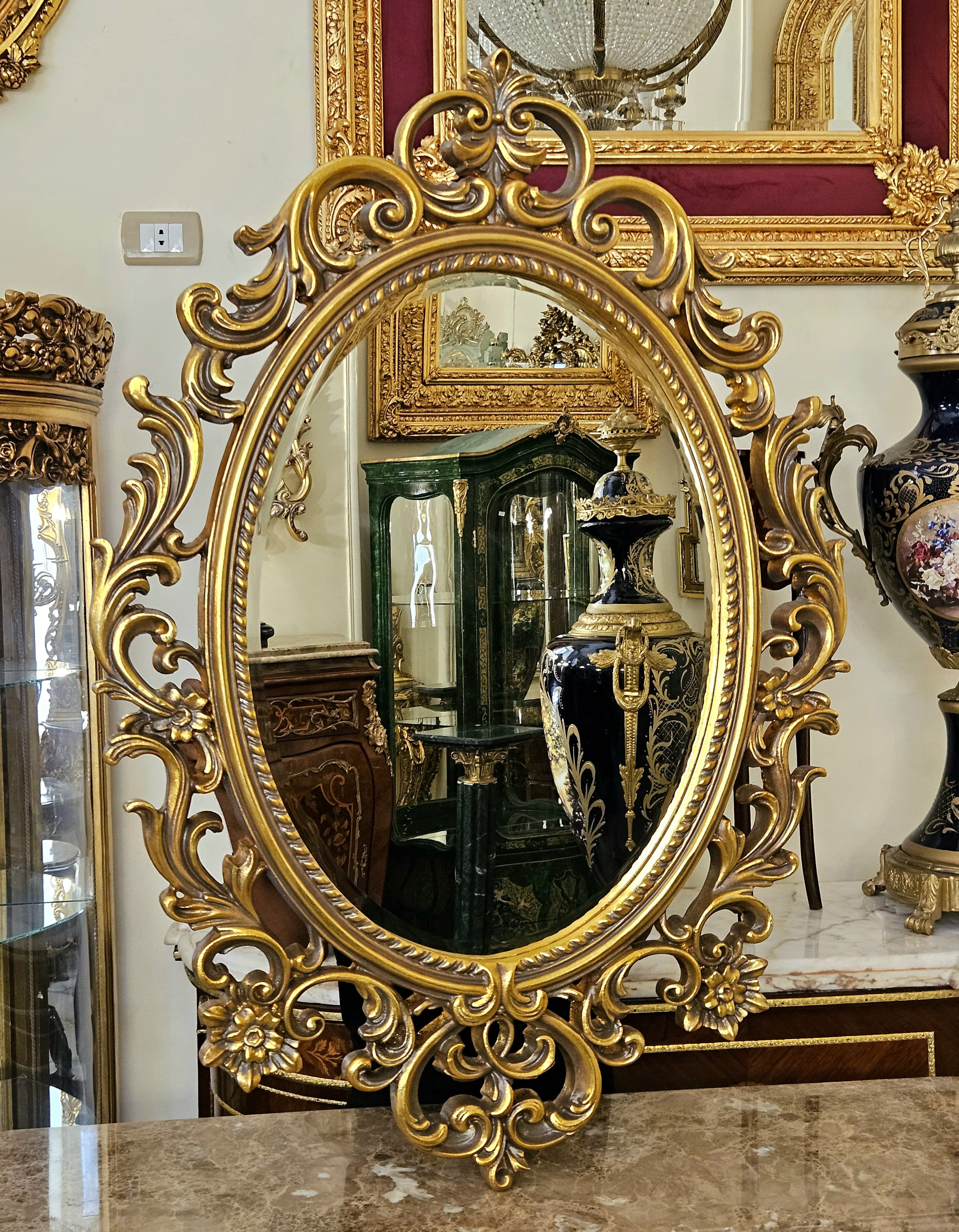 Grand French Rococo Oval Mirror – Ornate Gold Leaf Frame with Elaborate Carved Details