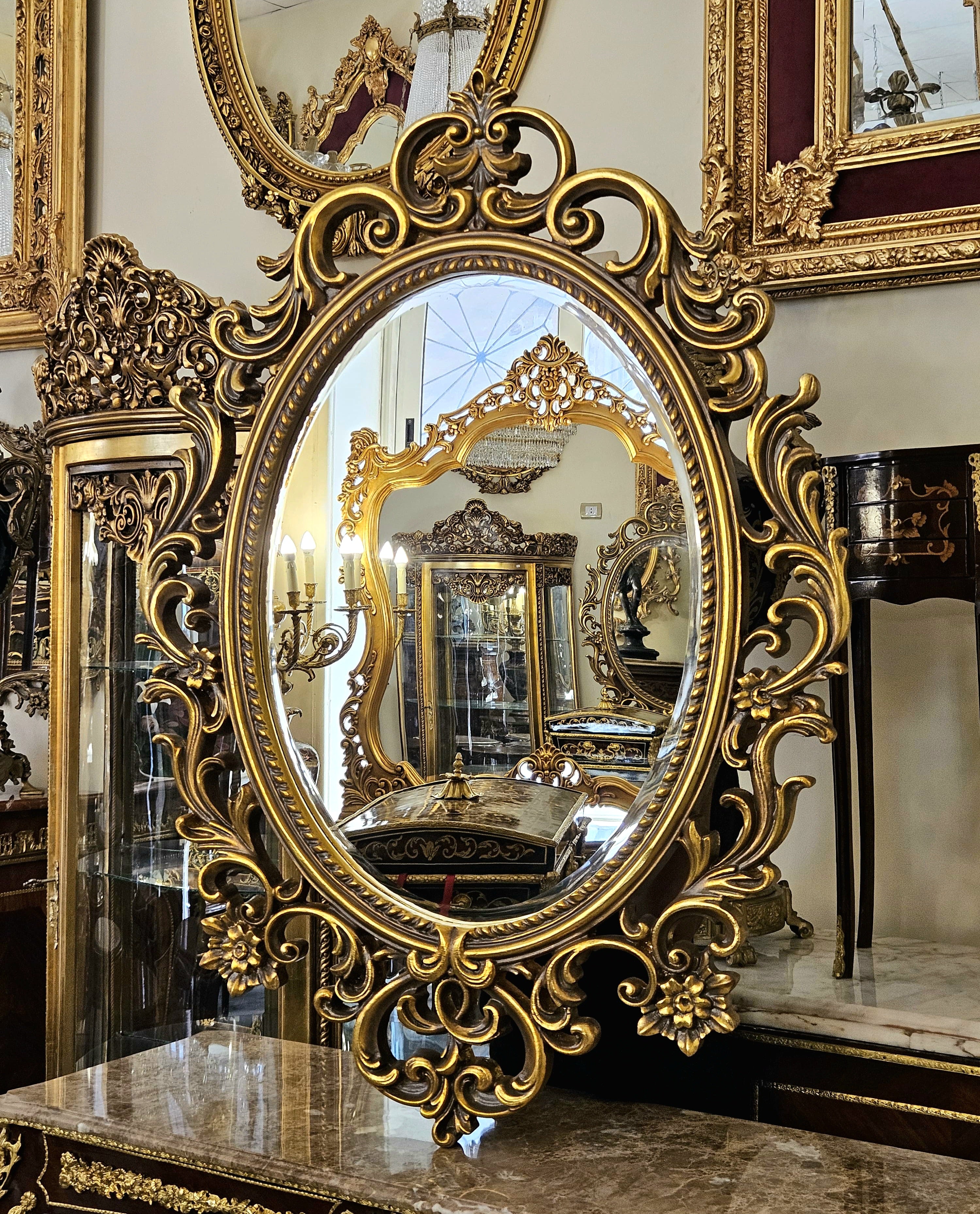 Grand French Rococo Oval Mirror – Ornate Gold Leaf Frame with Elaborate Carved Details