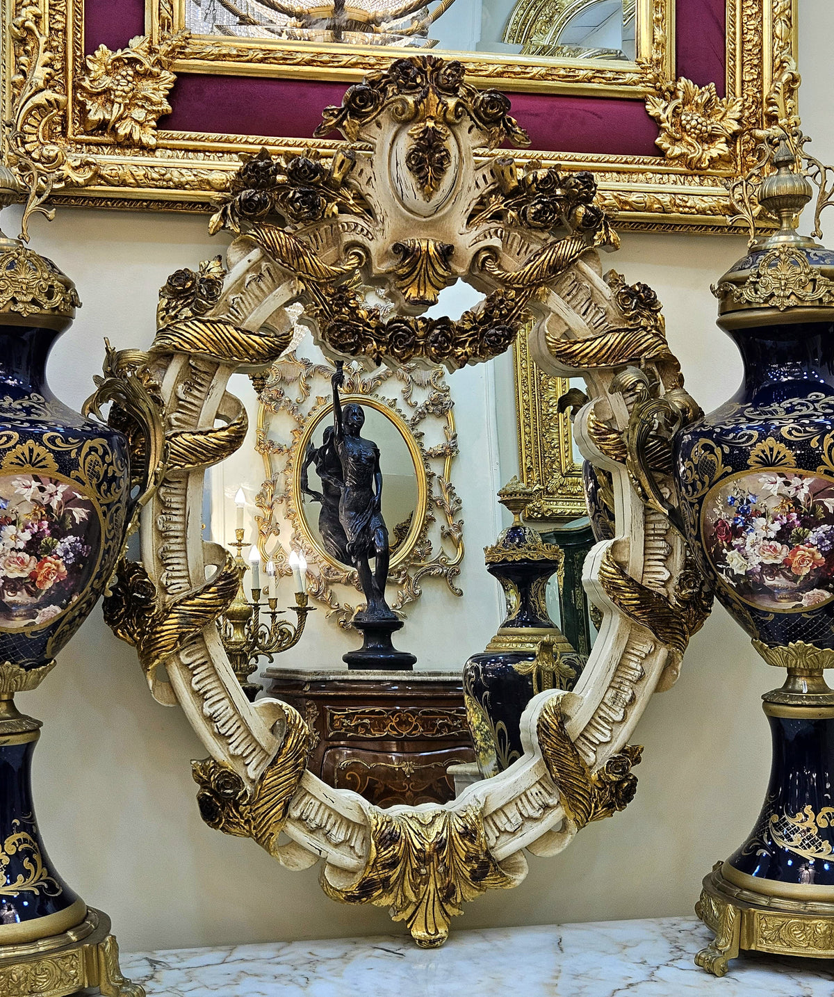 French Baroque Oval Mirror – Handcrafted Floral Gilt Frame with Sculptural Gold Leaf Ornamentation