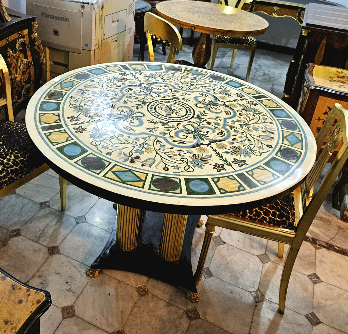 Grand French-Style Round Dining Table – Ornate Marble Top with Gilded Columns & Black Base