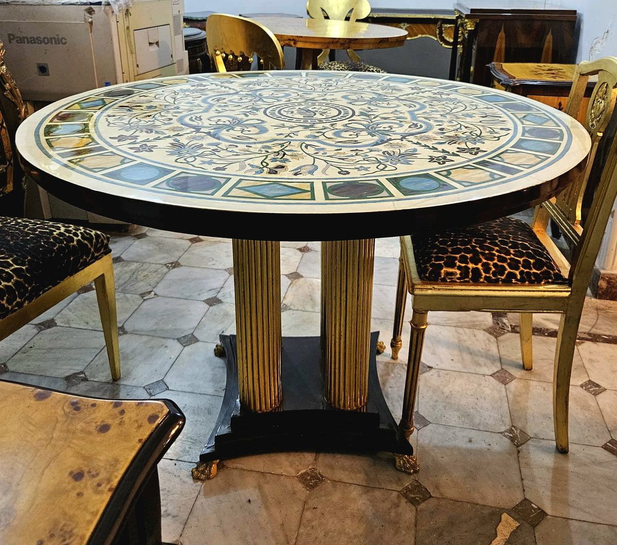 Grand French-Style Round Dining Table – Ornate Marble Top with Gilded Columns & Black Base