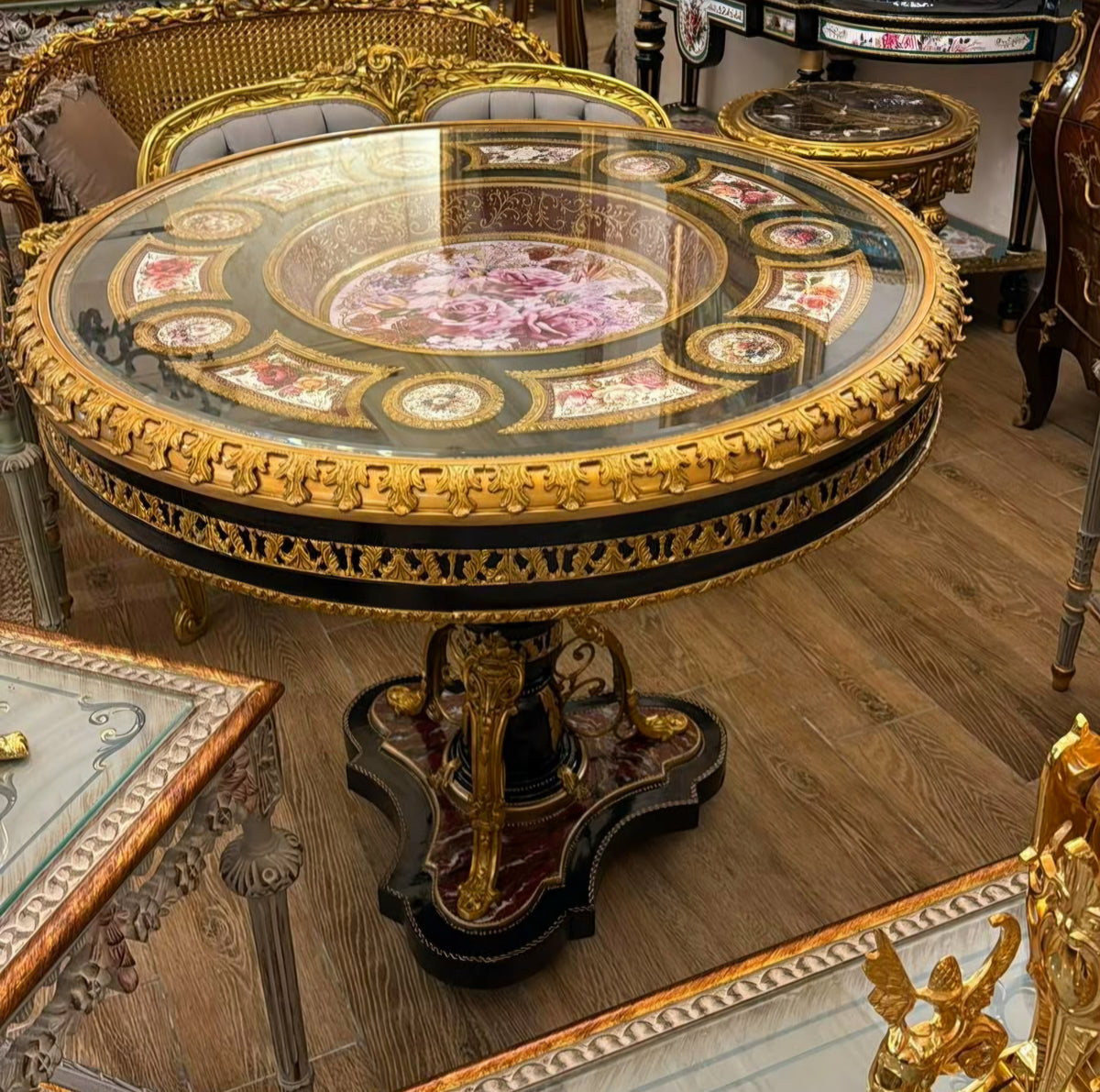 Grand French-Inspired Round Dining Table – Black Pedestal Base, Floral Decorative Inlay & Ornate Gold Leaf Details