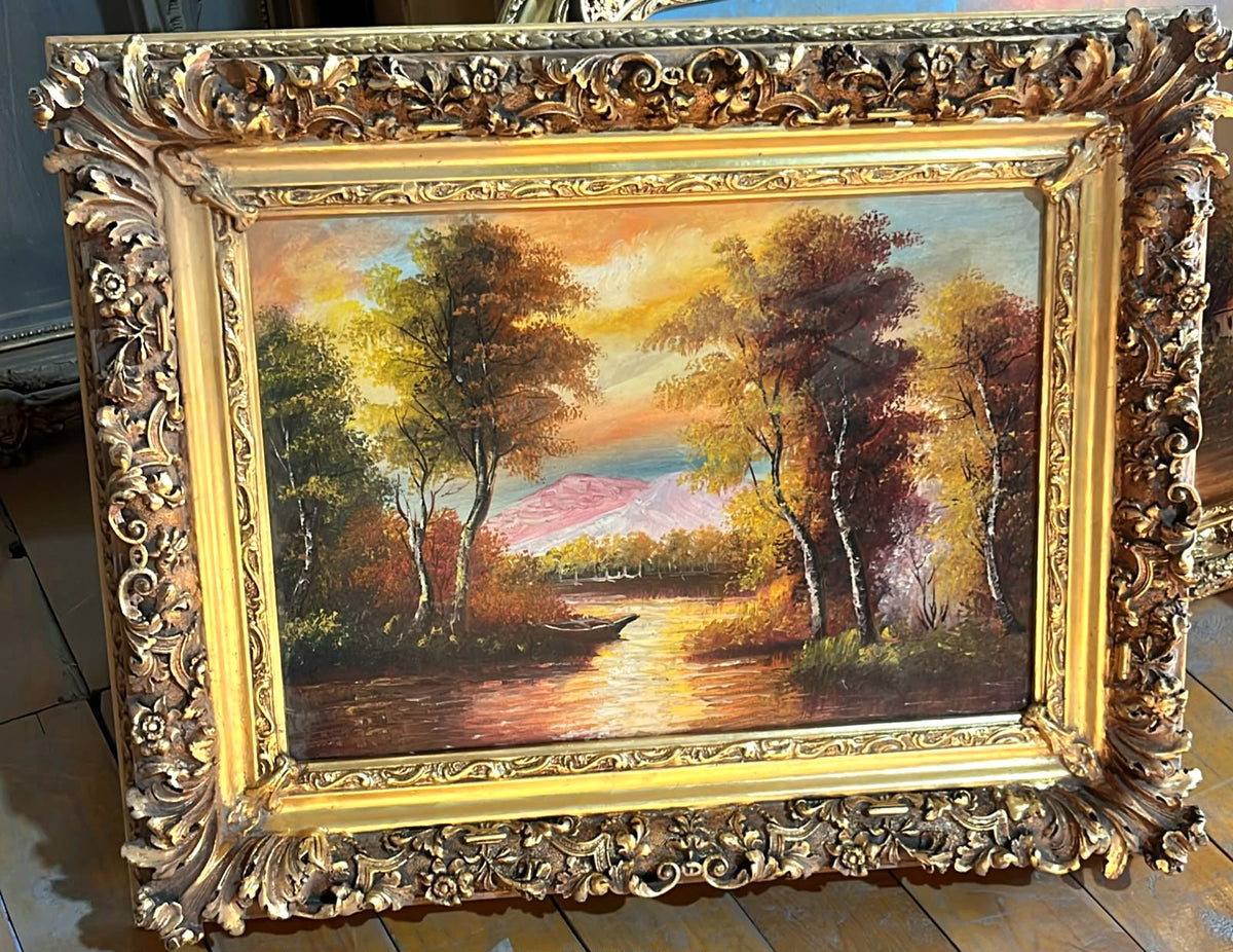 Ornate Landscape Painting – Golden Sunset Over a Lake with Sculpted Gold Leaf Frame