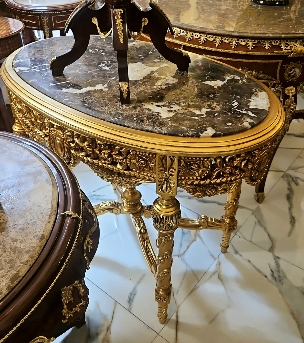 Regal Centerpiece in Gold – French Louis XVI Marble-Top Coffee Table with Sculpted Gilt Ornamentation