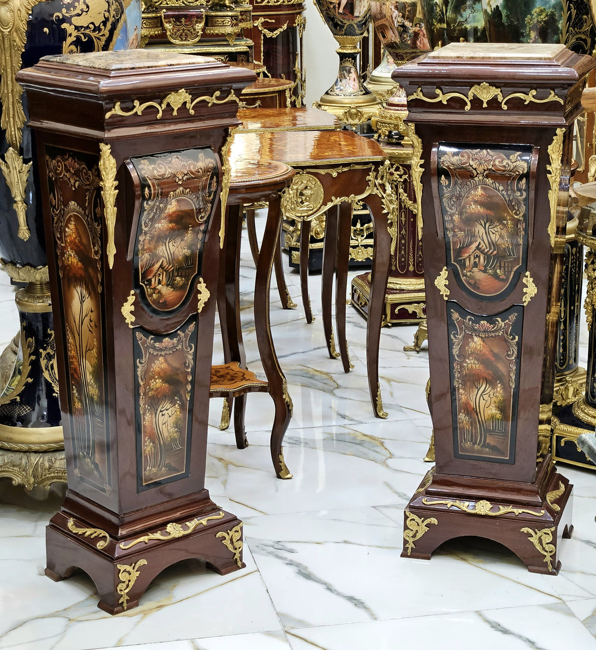 The Gilded Duo – Ornate Wooden Pedestal Pair with Scenic Artwork & Marble Tops