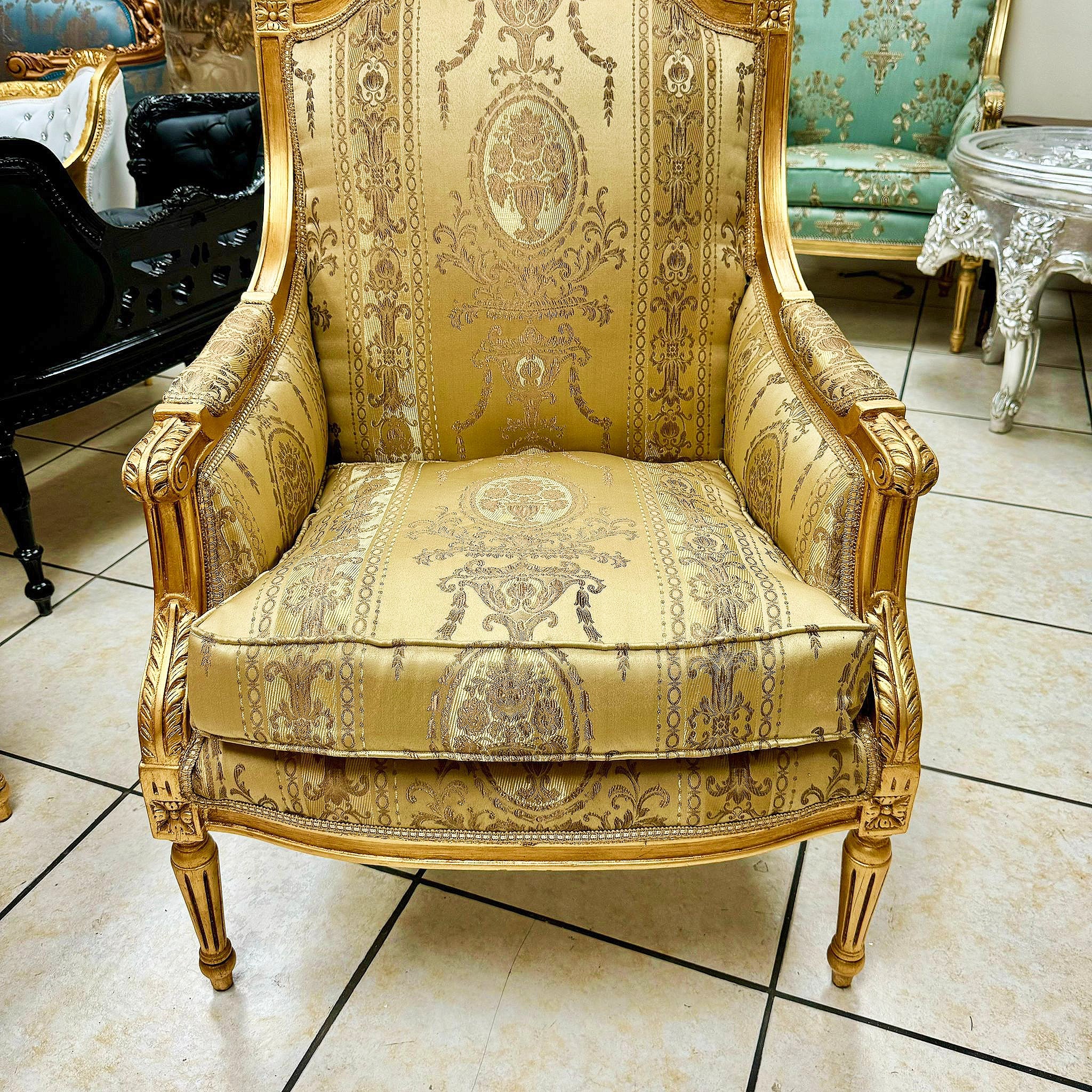 French Louis XV Style Gold Bergere Wing Chair with Gold Leaf Details